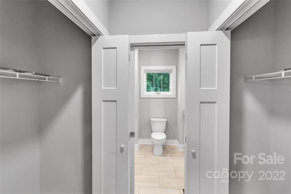 225 Ridge View Drive, Unit 16 Clyde, NC 28721 - Photo 15 of 29 a bathroom with a shower
