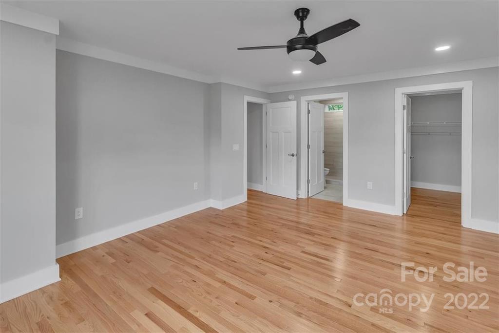 225 Ridge View Drive, Unit 16 Clyde, NC 28721 - Photo 20 of 29 a view of empty room with wooden floor