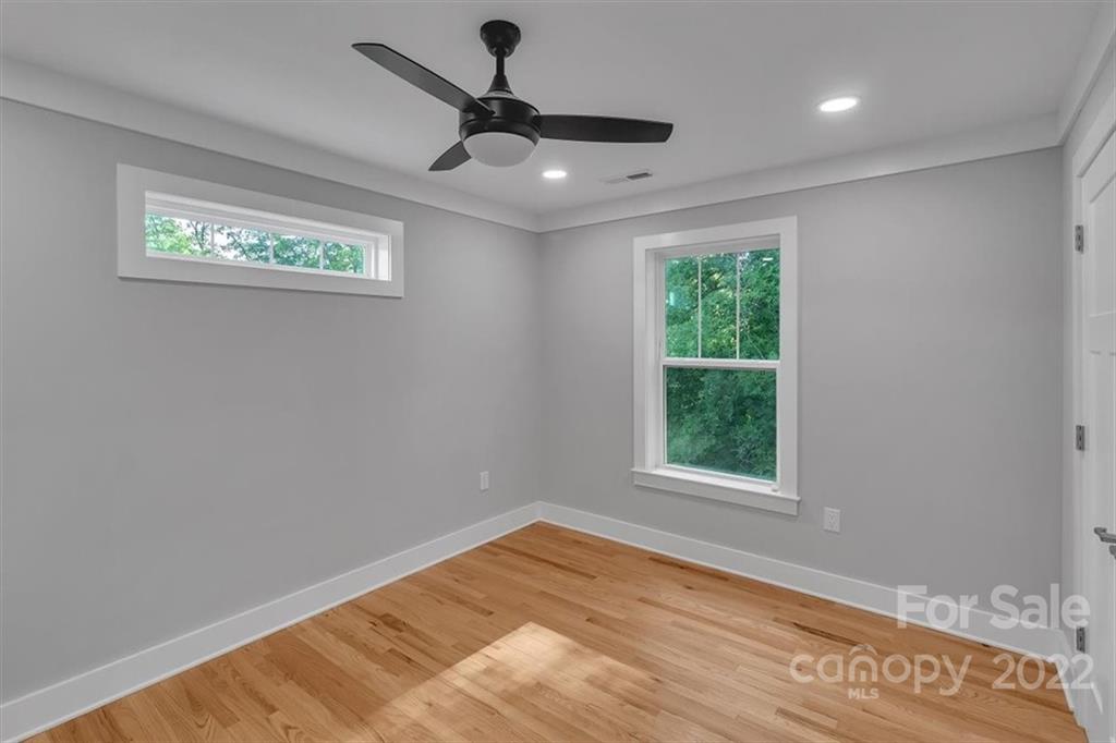 225 Ridge View Drive, Unit 16 Clyde, NC 28721 - Photo 24 of 29 a view of an empty room with a window