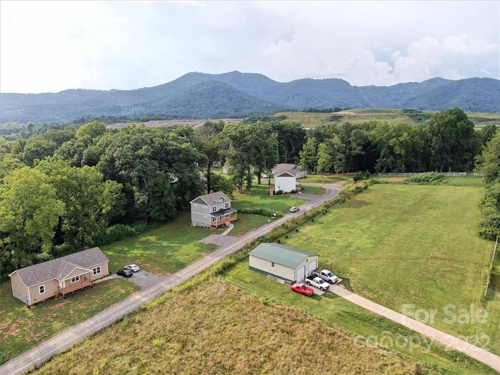 225 Ridge View Drive, Unit 16 Clyde, NC 28721 - Photo 9 of 29 a view of a swimming pool with a mountain view