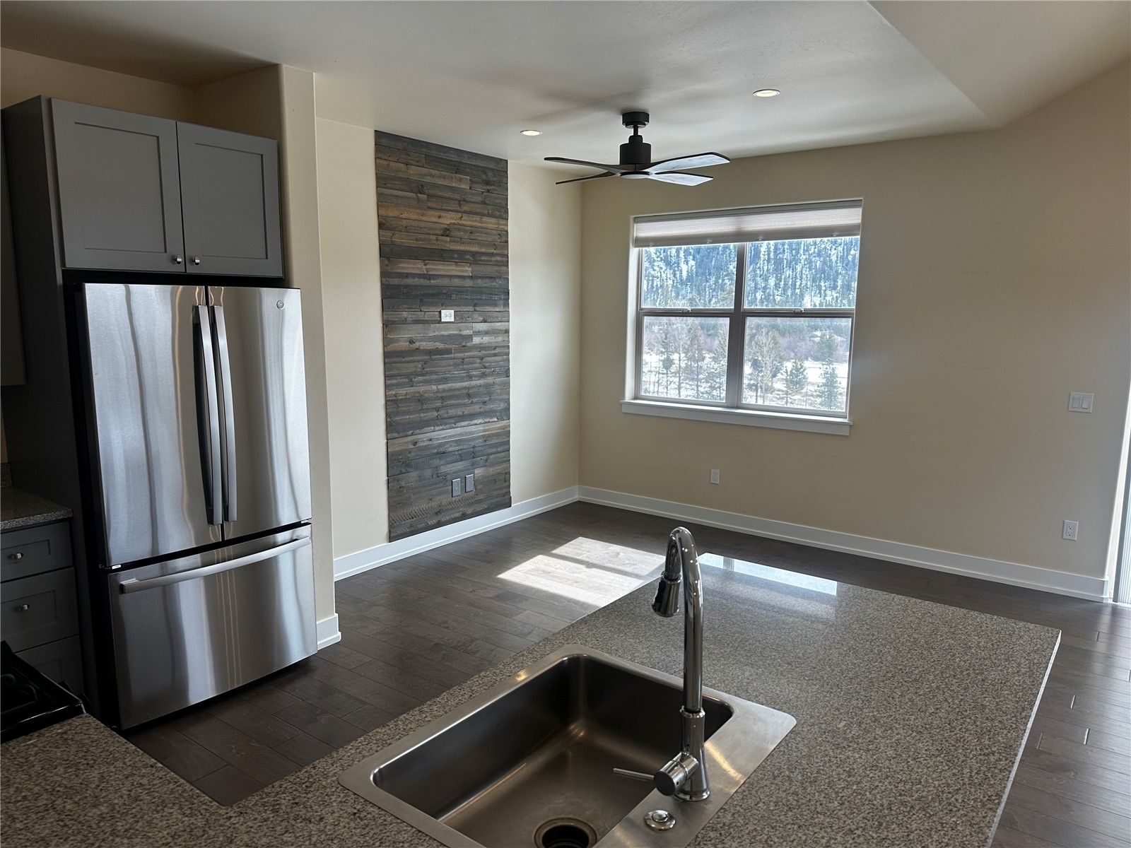 141 Wayback Drive, Unit B Keystone, CO 80435 - Photo 5 of 16 a view of a refrigerator in kitchen and wooden floor