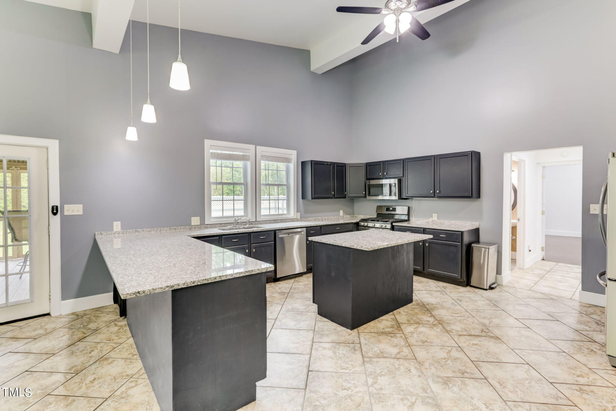 1538 Marly Drive Durham, NC 27703 - Photo 13 of 40 a kitchen with a sink cabinets and window