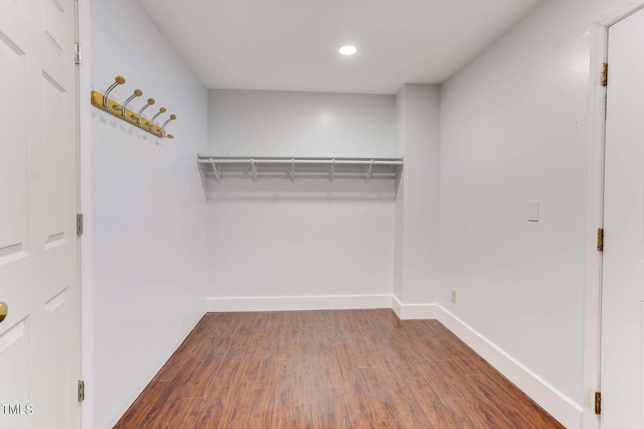 1538 Marly Drive Durham, NC 27703 - Photo 20 of 40 a view of an empty room with wooden floor