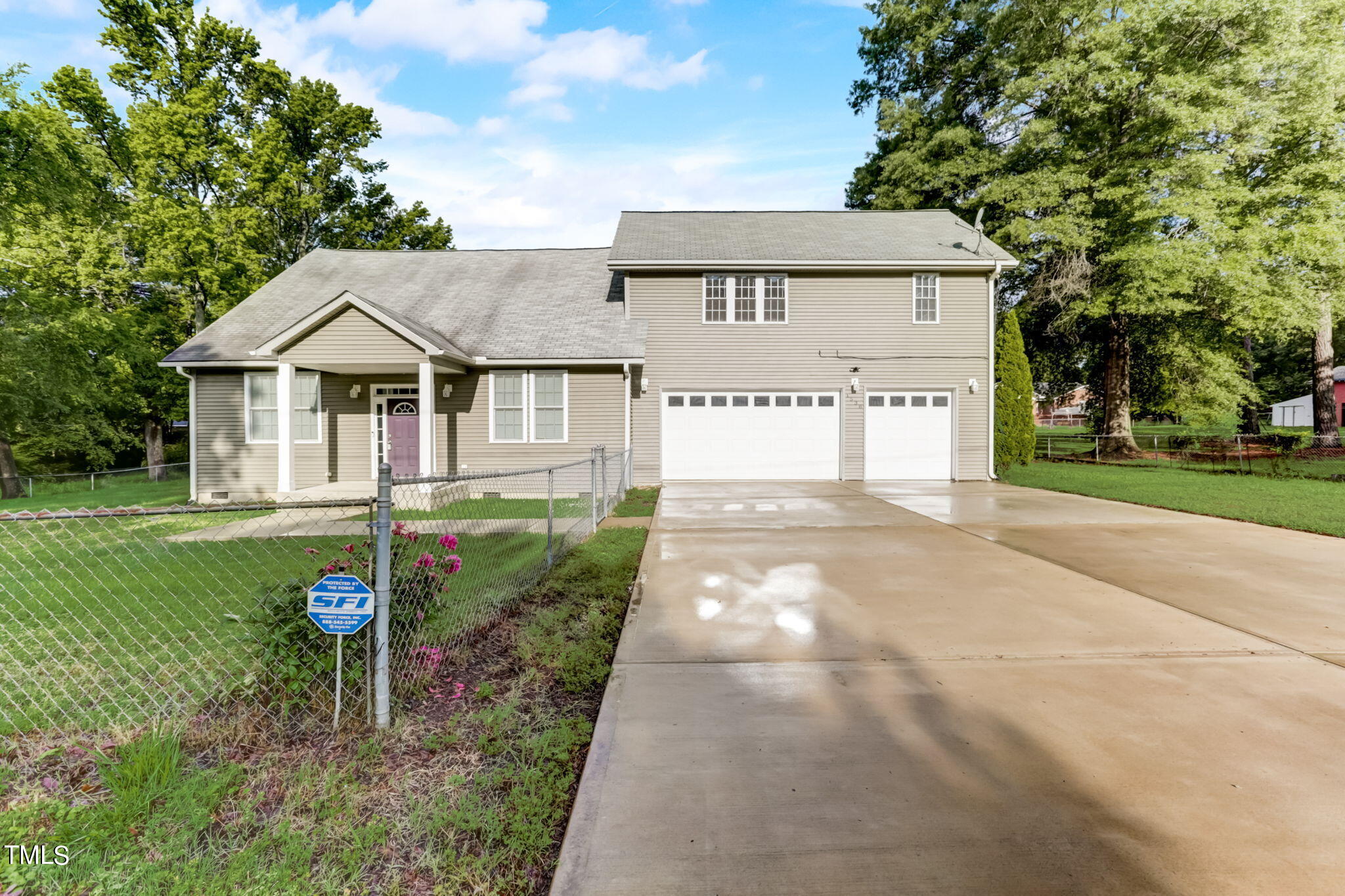 1538 Marly Drive Durham, NC 27703 - Photo 2 of 40 a front view of a house with garden
