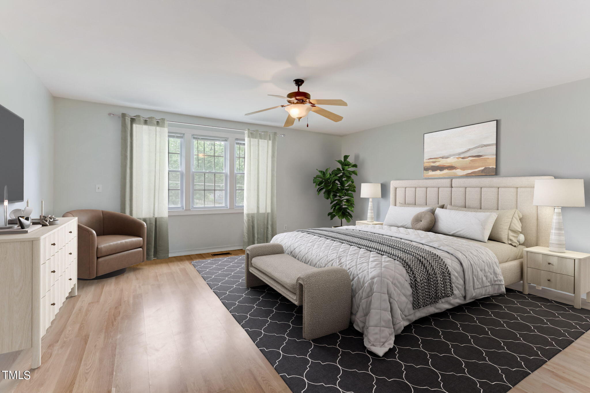 1538 Marly Drive Durham, NC 27703 - Photo 23 of 40 a bedroom with a large bed and a chandelier