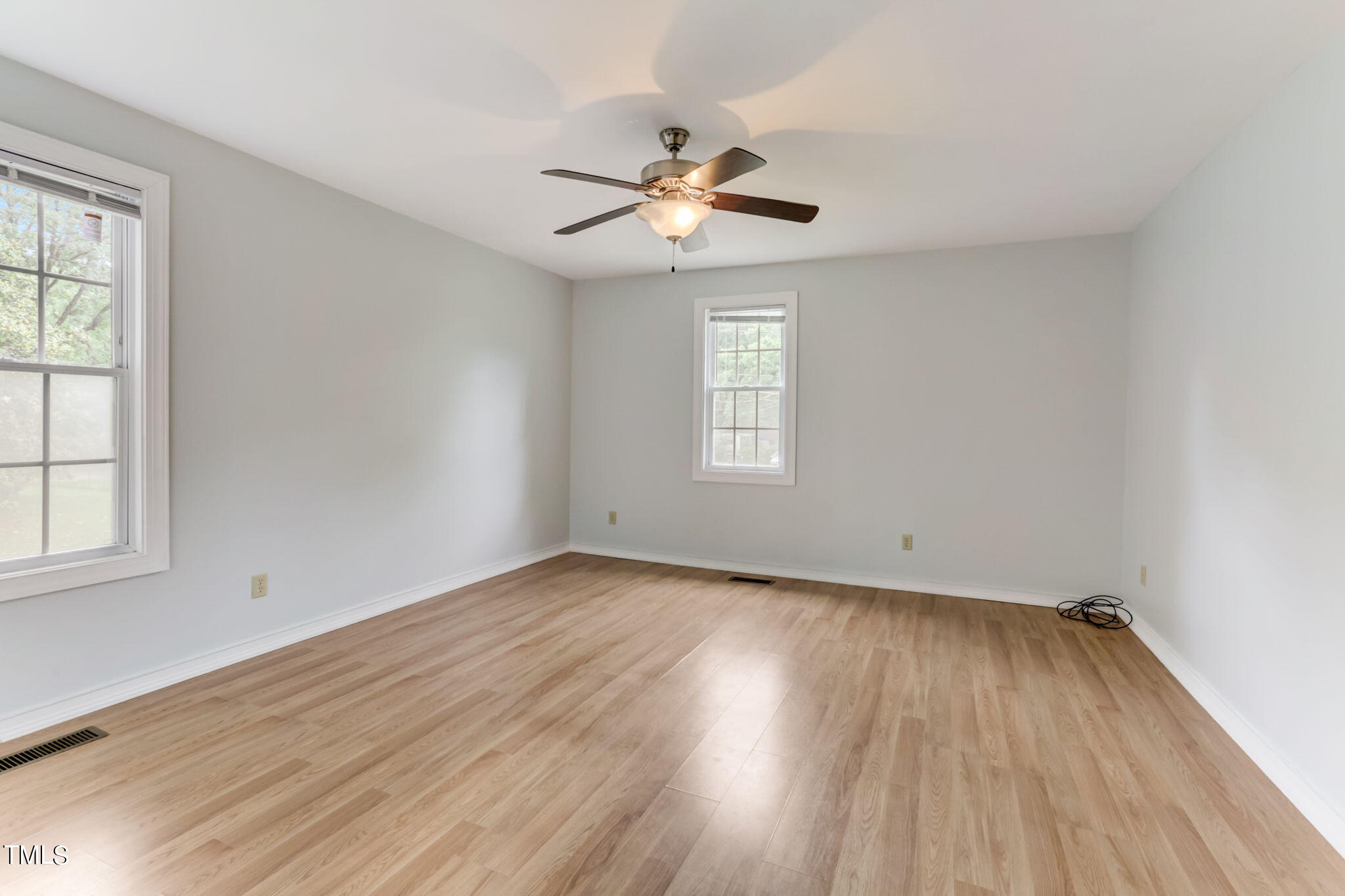1538 Marly Drive Durham, NC 27703 - Photo 25 of 40 wooden floor in an empty room with a window