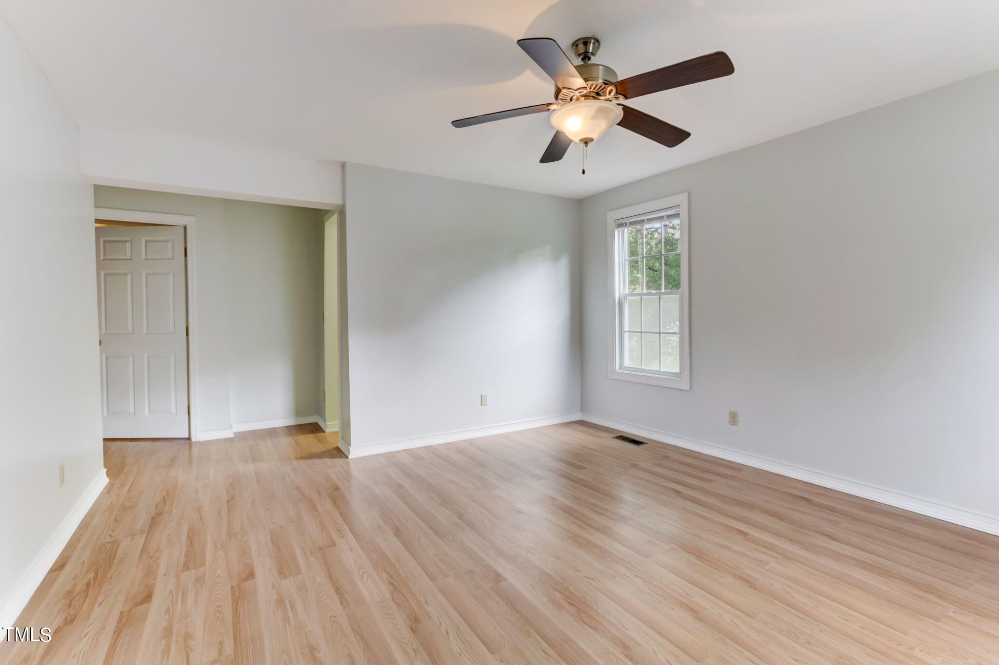 1538 Marly Drive Durham, NC 27703 - Photo 26 of 40 wooden floor in an empty room with a window