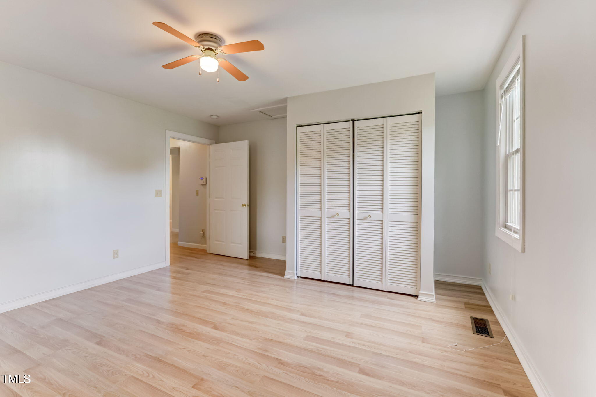 1538 Marly Drive Durham, NC 27703 - Photo 28 of 40 wooden floor in an empty room with a window