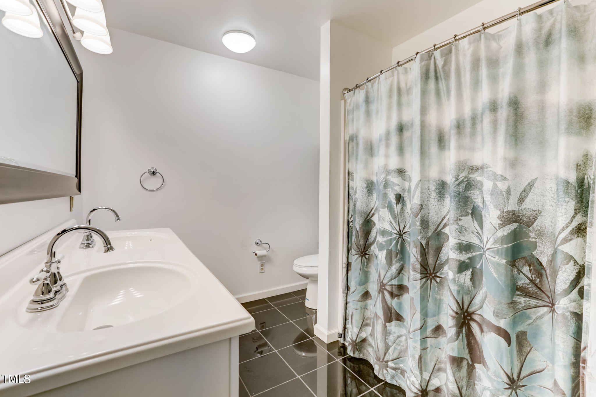1538 Marly Drive Durham, NC 27703 - Photo 30 of 40 a bathroom with a sink and a toilet