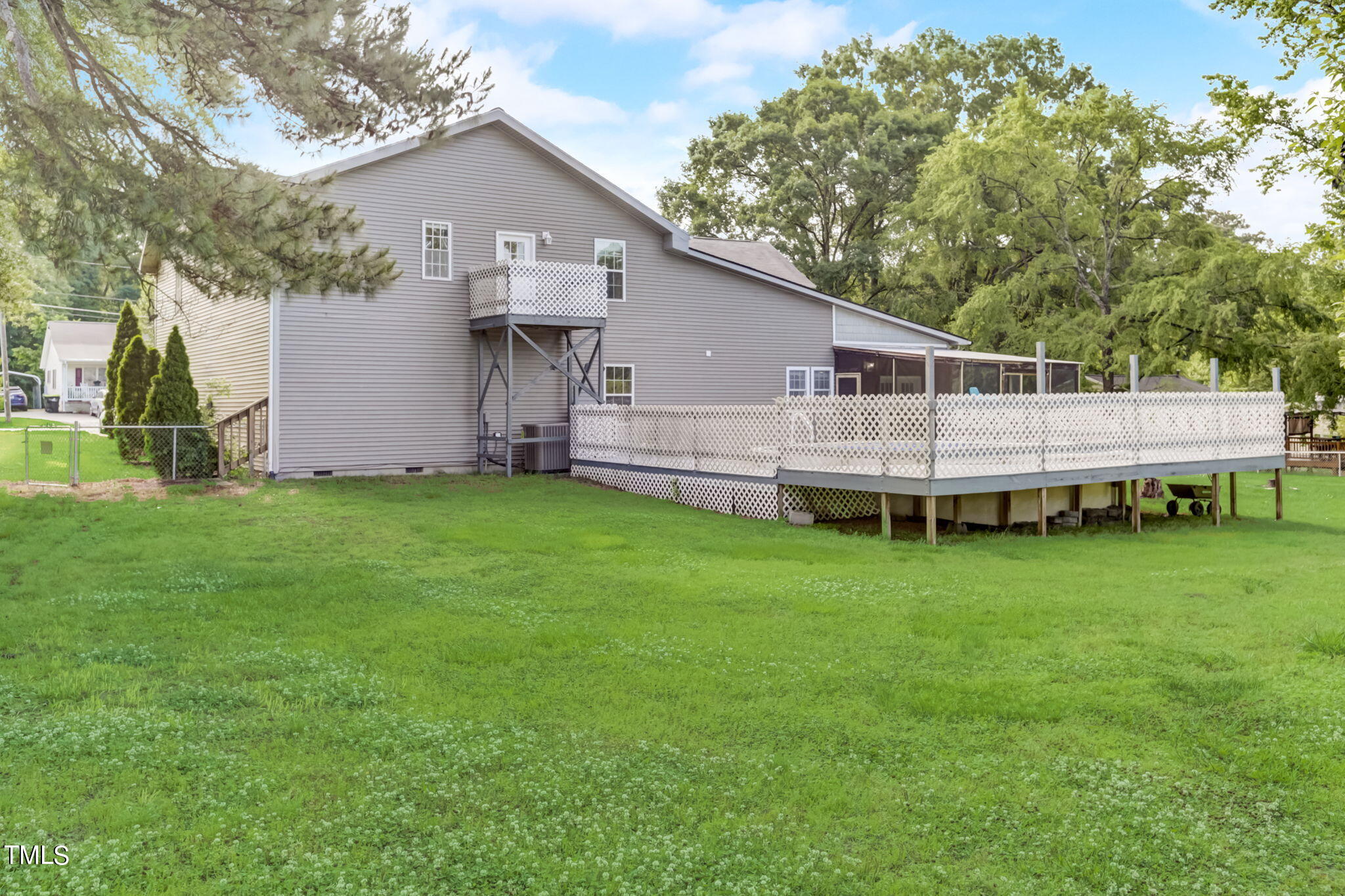 1538 Marly Drive Durham, NC 27703 - Photo 38 of 40 a front view of house with backyard and green space