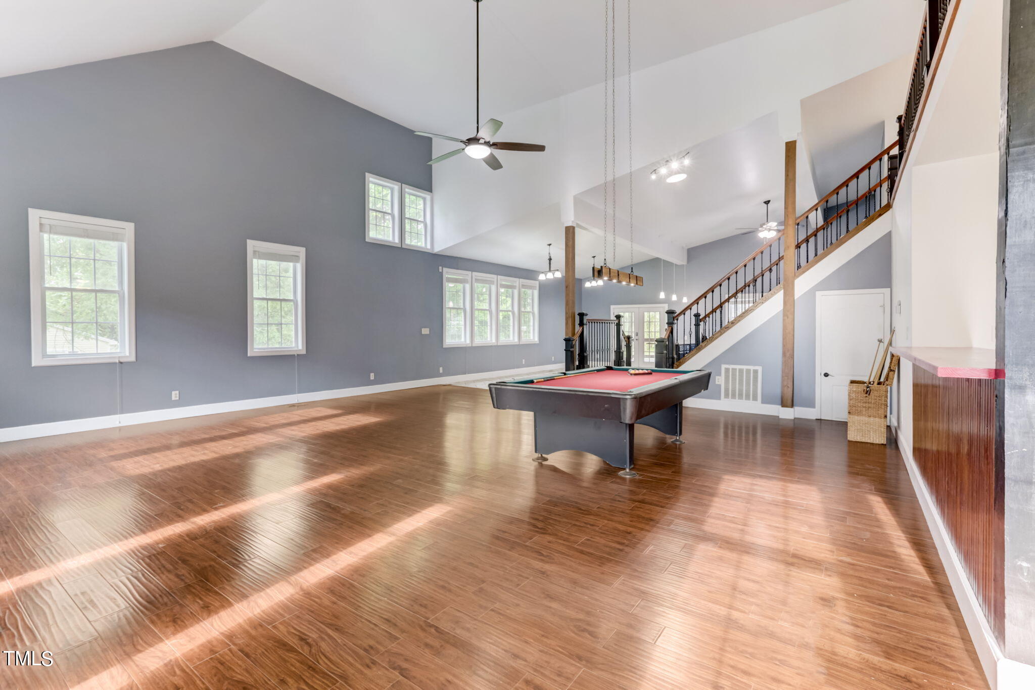 1538 Marly Drive Durham, NC 27703 - Photo 6 of 40 a view of an entryway with wooden floor and a fire place