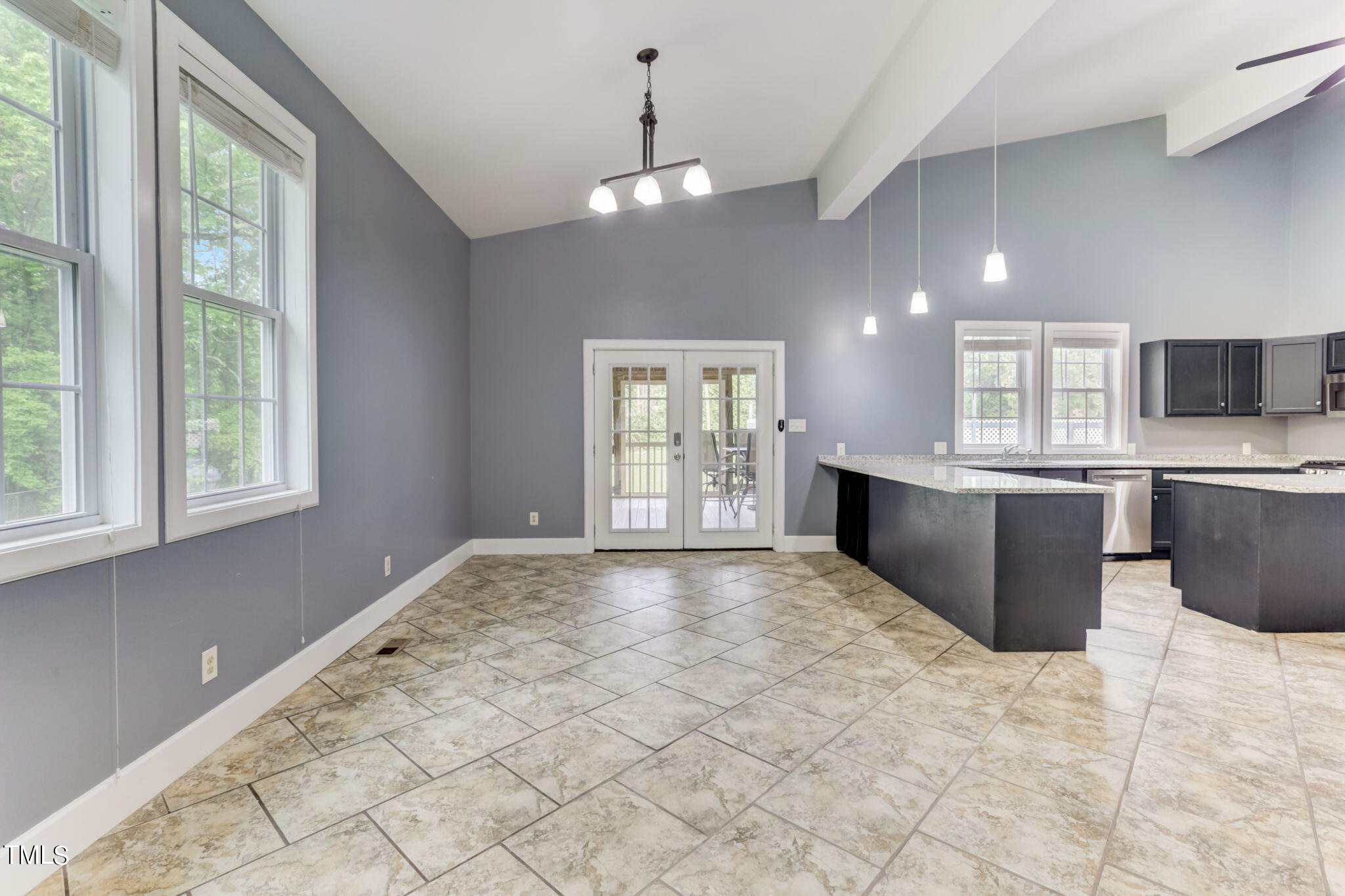 1538 Marly Drive Durham, NC 27703 - Photo 10 of 40 a view of an empty room with a kitchen