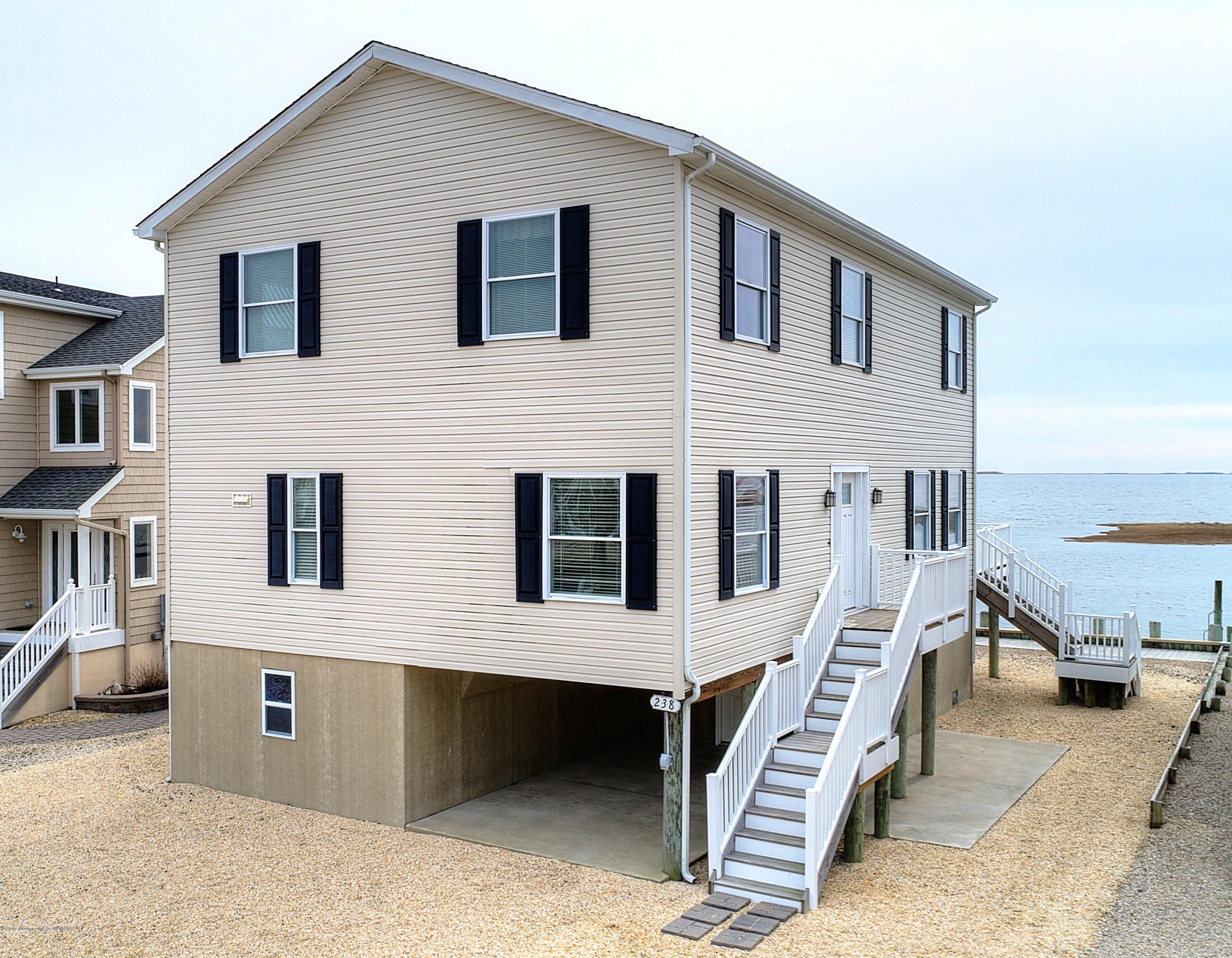 a front view of a house with a garage