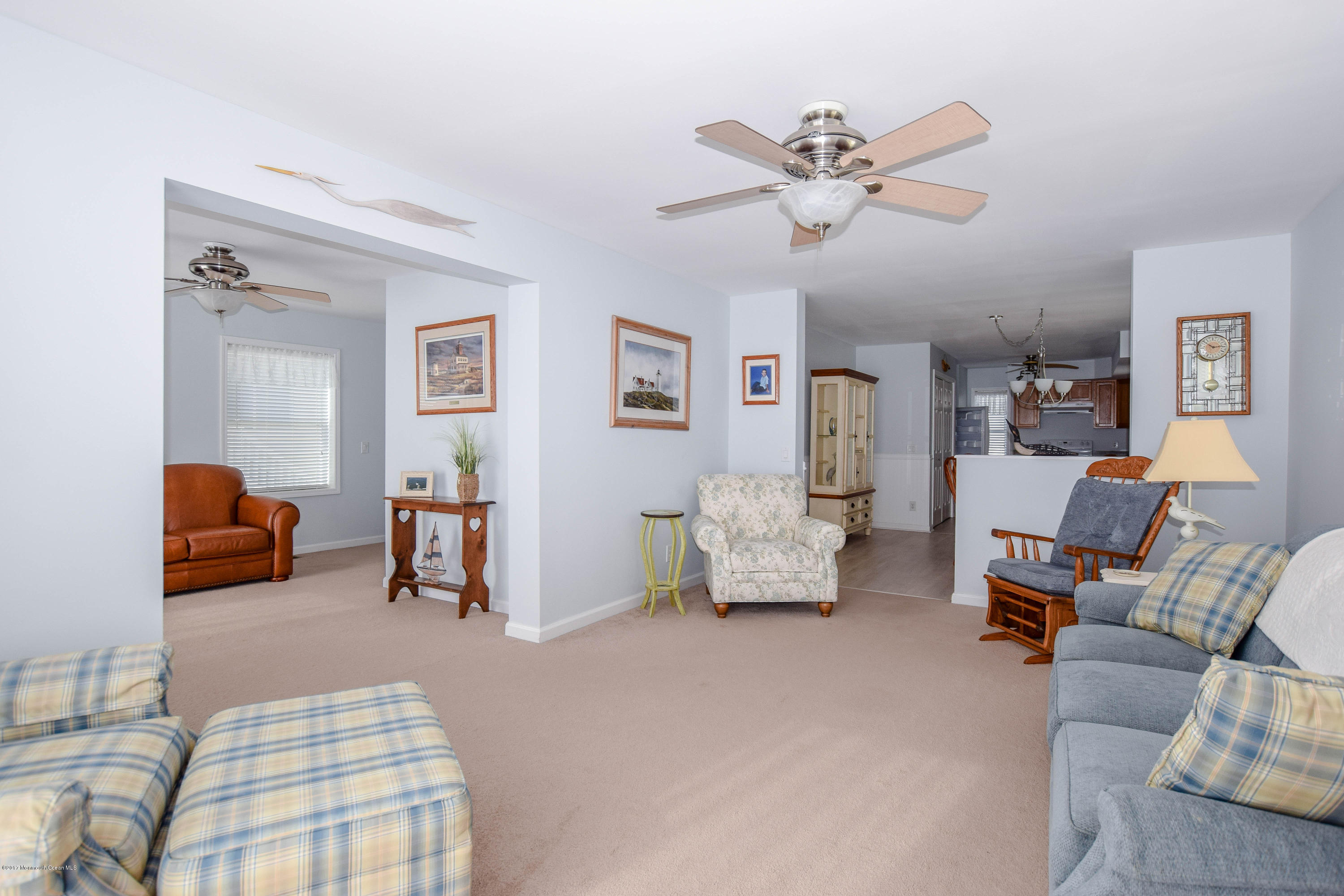 238 Heron Road Tuckerton, NJ 08087 - Photo 11 of 51 a living room with furniture and a ceiling fan