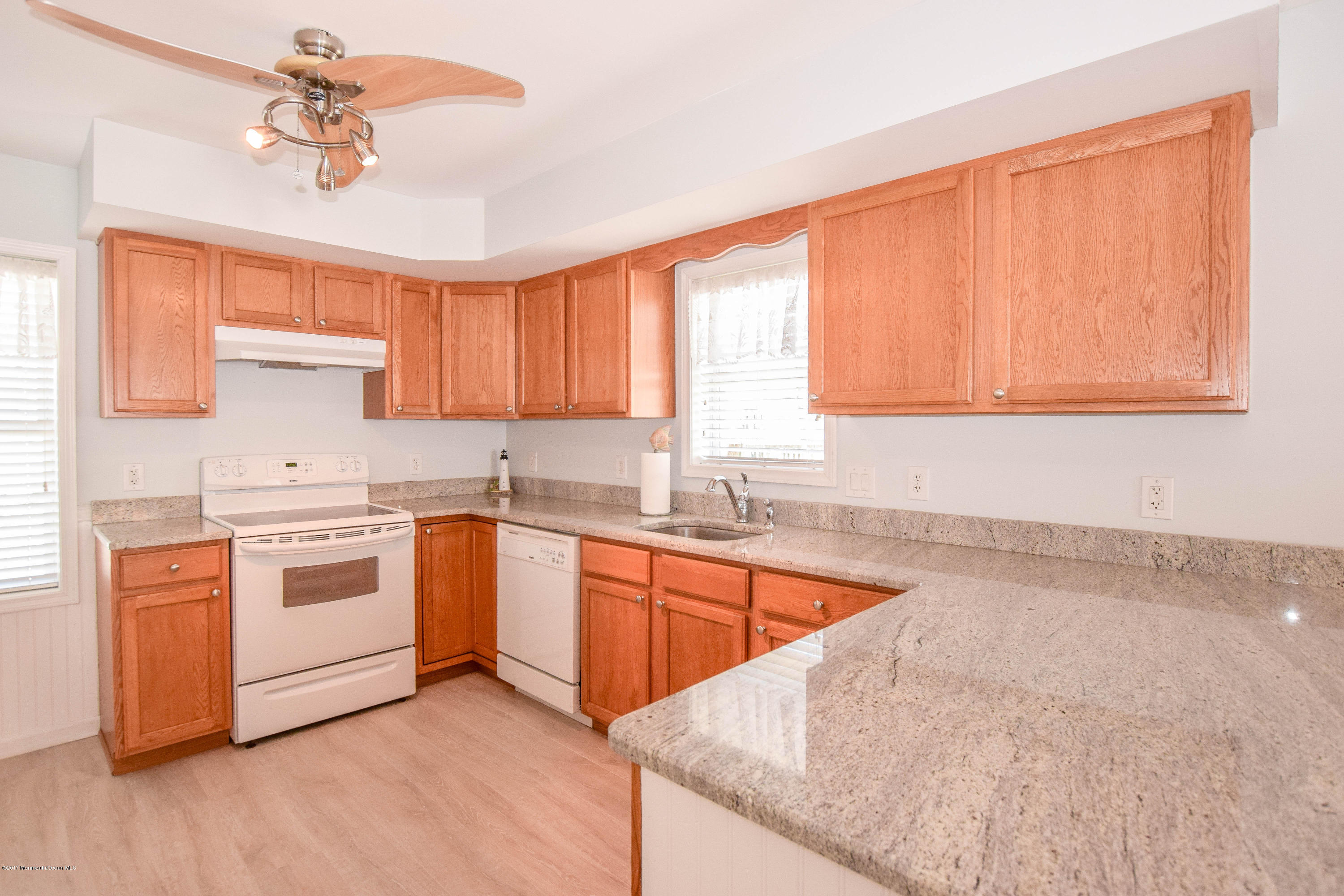 238 Heron Road Tuckerton, NJ 08087 - Photo 15 of 51 a kitchen with stainless steel appliances granite countertop a sink a stove cabinets counter space and a window