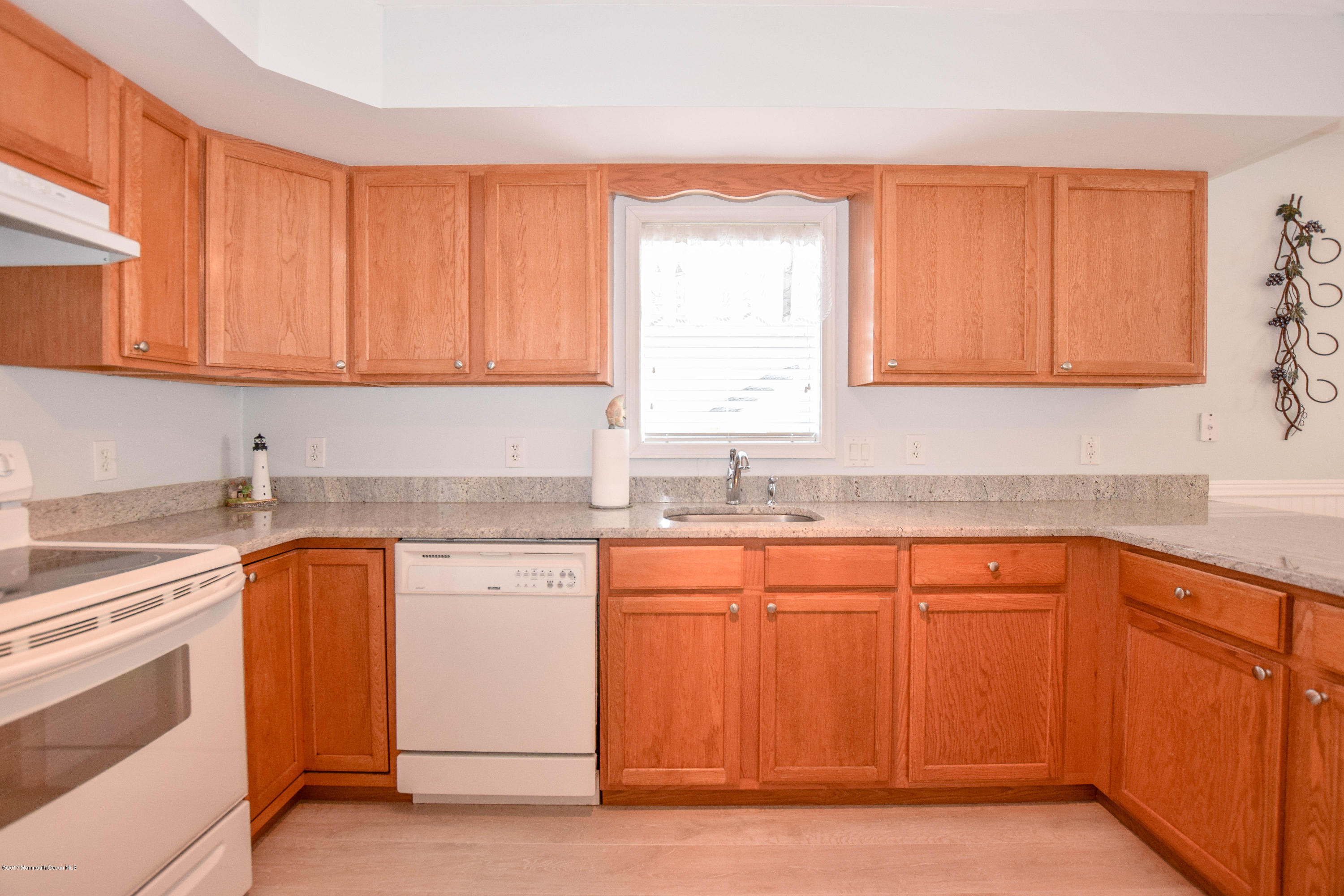 238 Heron Road Tuckerton, NJ 08087 - Photo 17 of 51 a kitchen with stainless steel appliances granite countertop a sink stove and cabinets