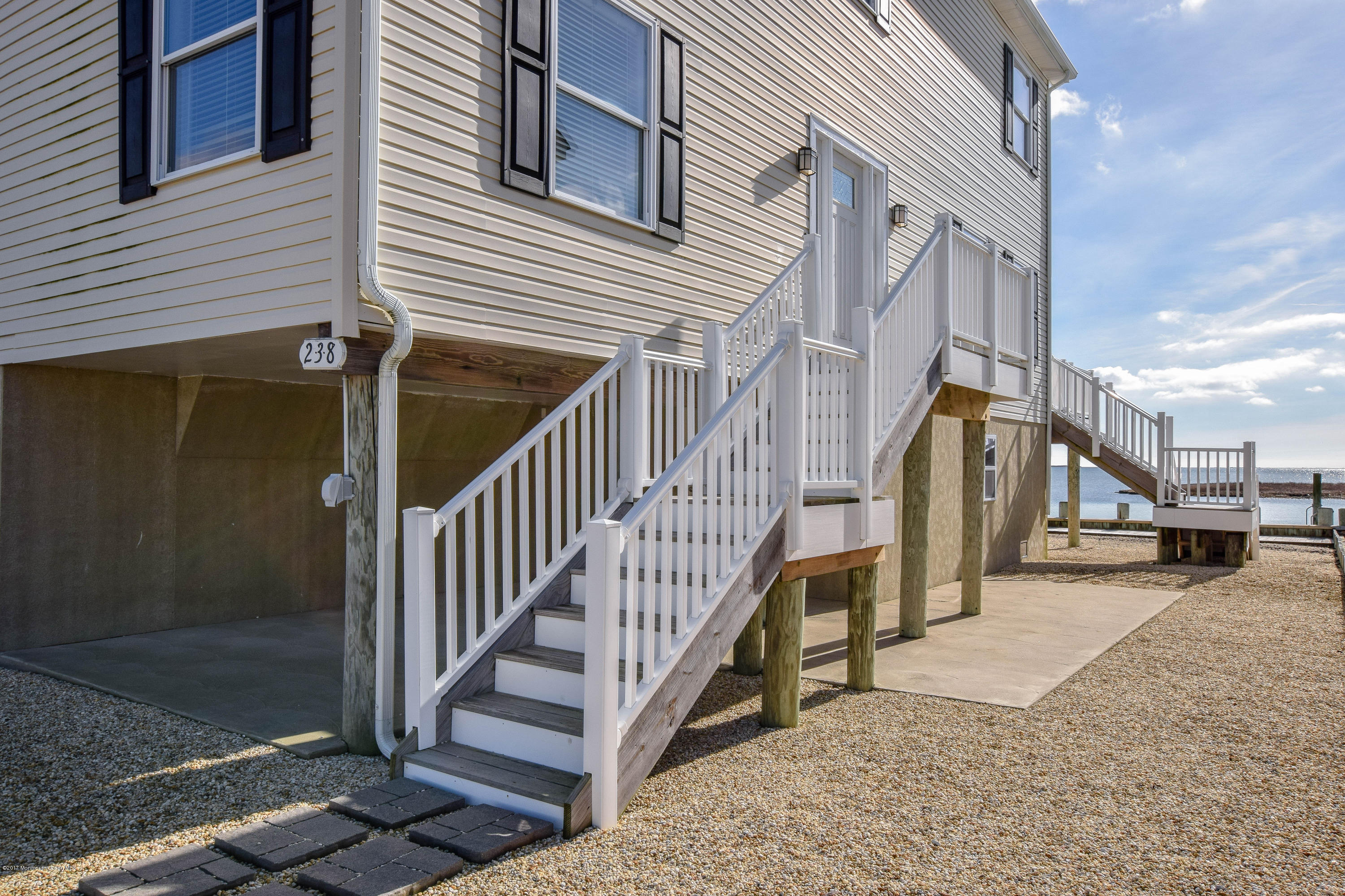 238 Heron Road Tuckerton, NJ 08087 - Photo 2 of 51 a view of a house with wooden stairs