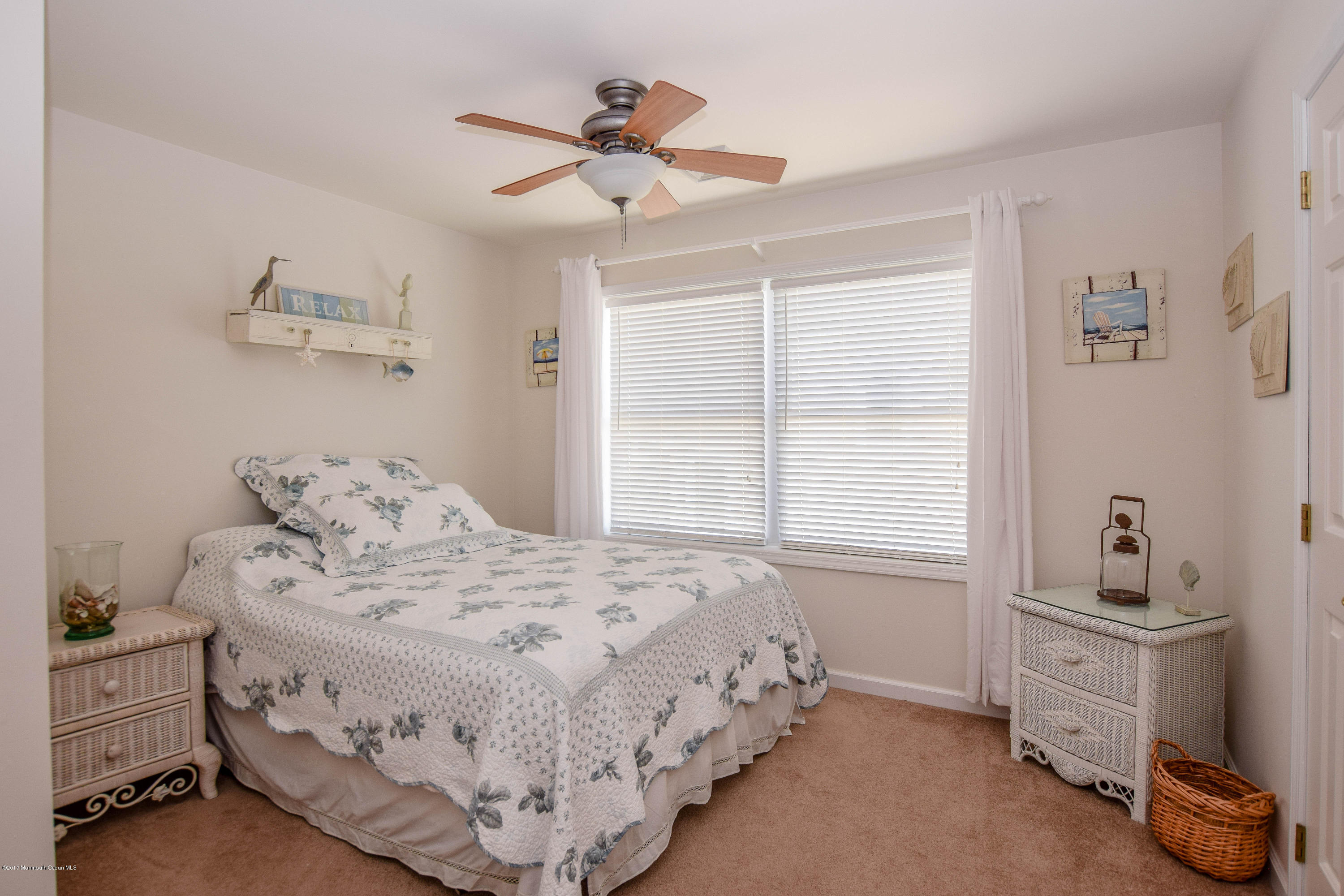 238 Heron Road Tuckerton, NJ 08087 - Photo 23 of 51 a bedroom with a bed and a window