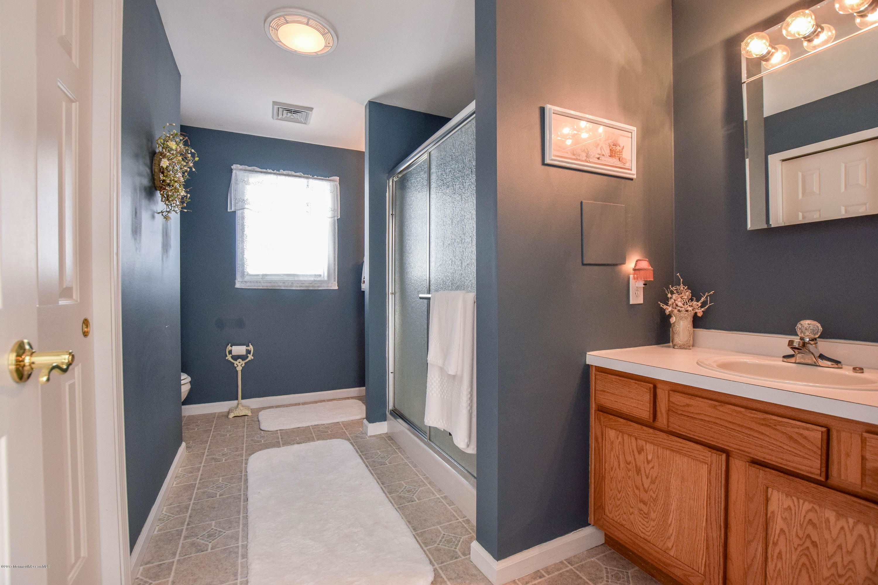 238 Heron Road Tuckerton, NJ 08087 - Photo 30 of 51 a room that has a sink and a mirror