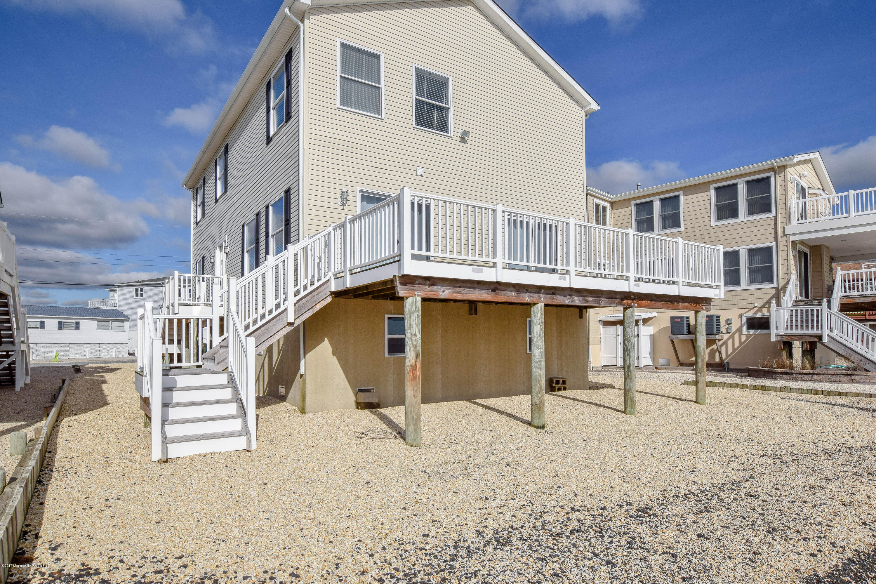 238 Heron Road Tuckerton, NJ 08087 - Photo 37 of 51 a view of a house with a roof deck