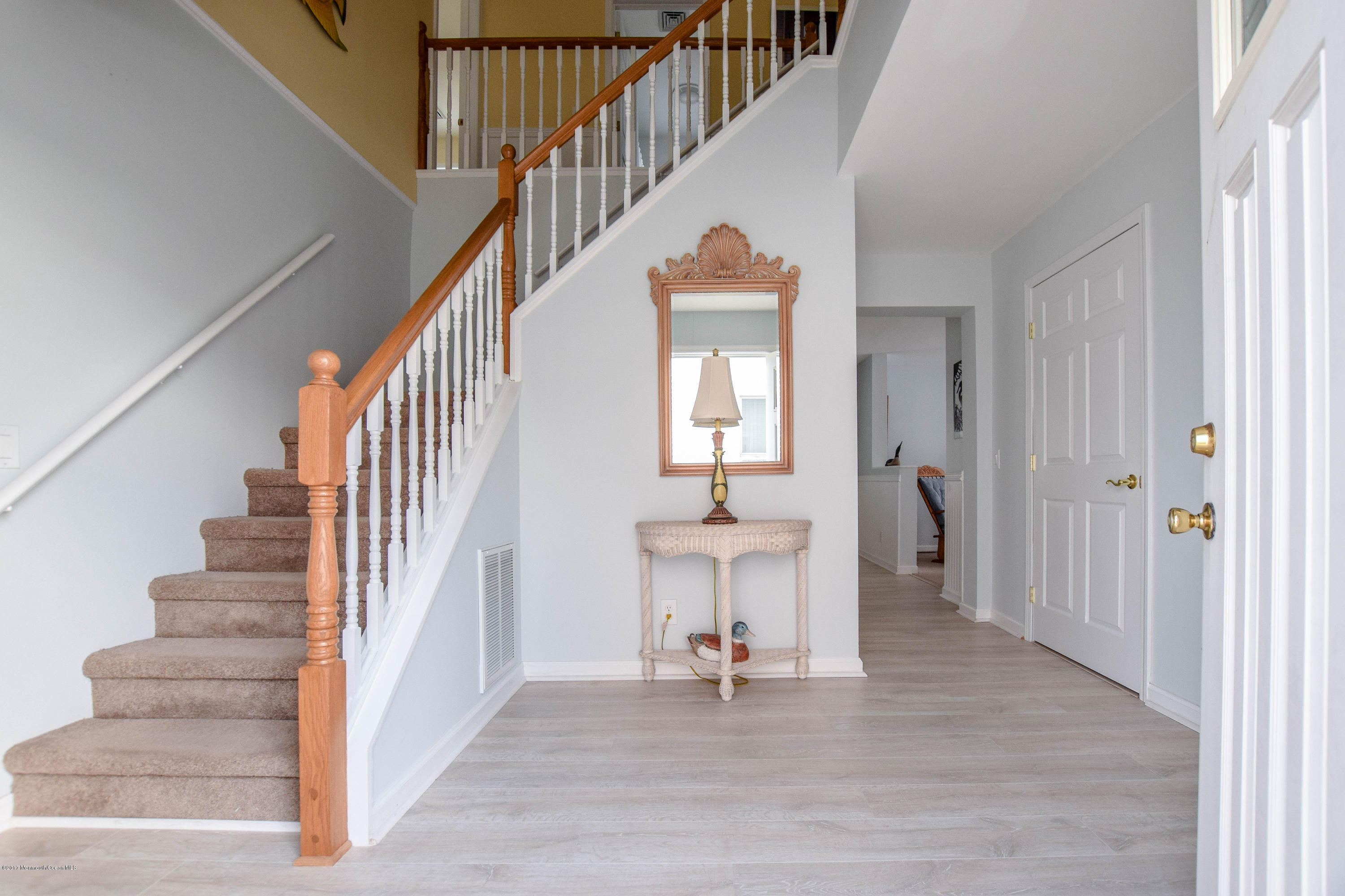 238 Heron Road Tuckerton, NJ 08087 - Photo 4 of 51 a view of entryway and hall with wooden floor