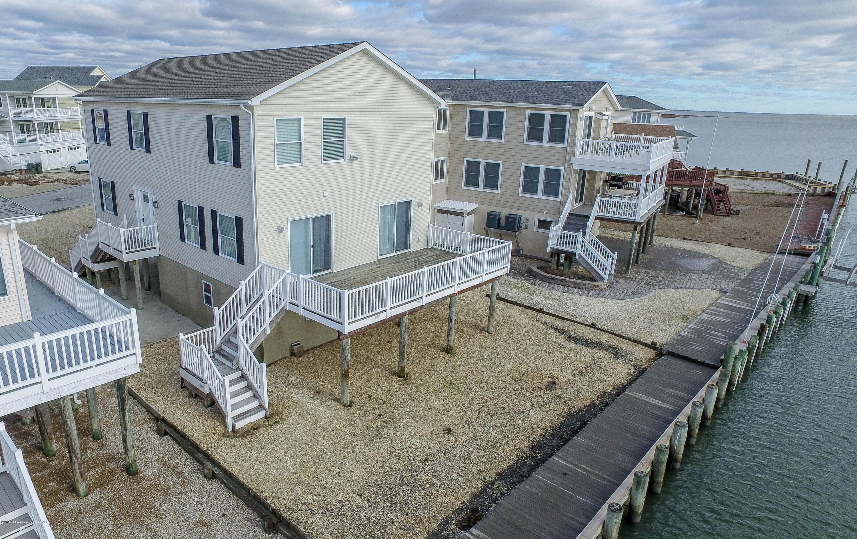238 Heron Road Tuckerton, NJ 08087 - Photo 44 of 51 a view of a house with roof deck