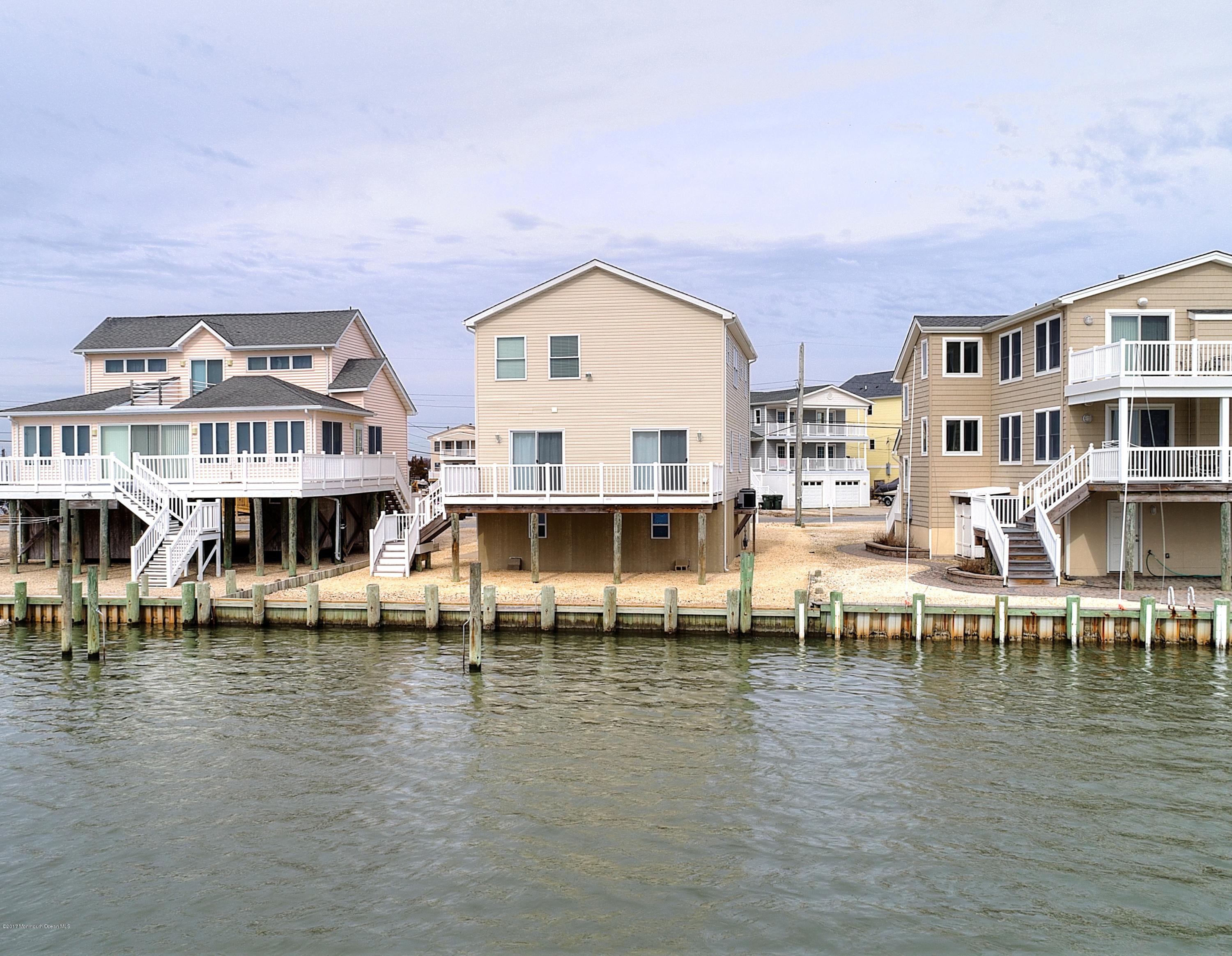 238 Heron Road Tuckerton, NJ 08087 - Photo 47 of 51 a view of building with river and boats