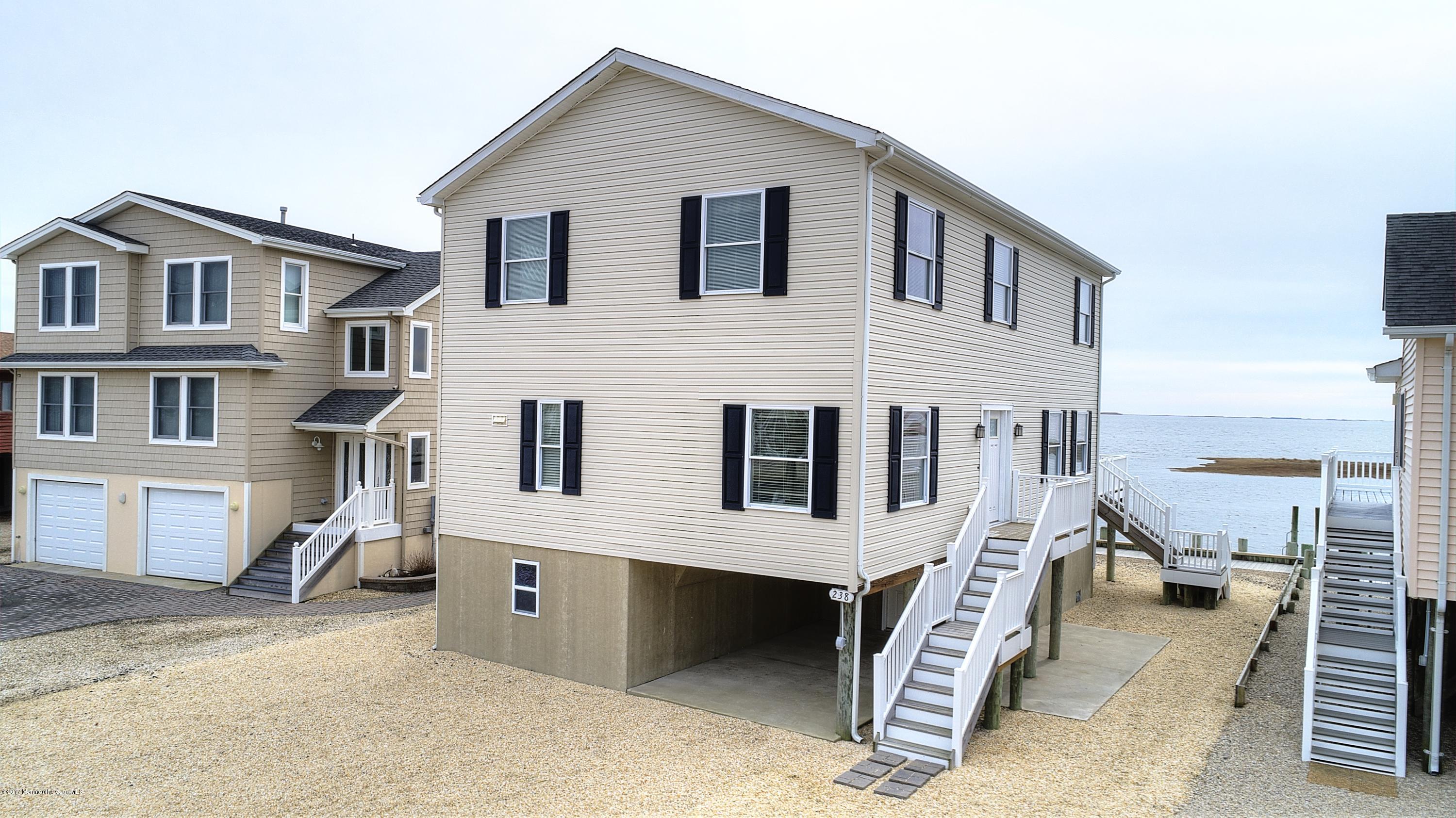 238 Heron Road Tuckerton, NJ 08087 - Photo 50 of 51 a view of a house with a backyard