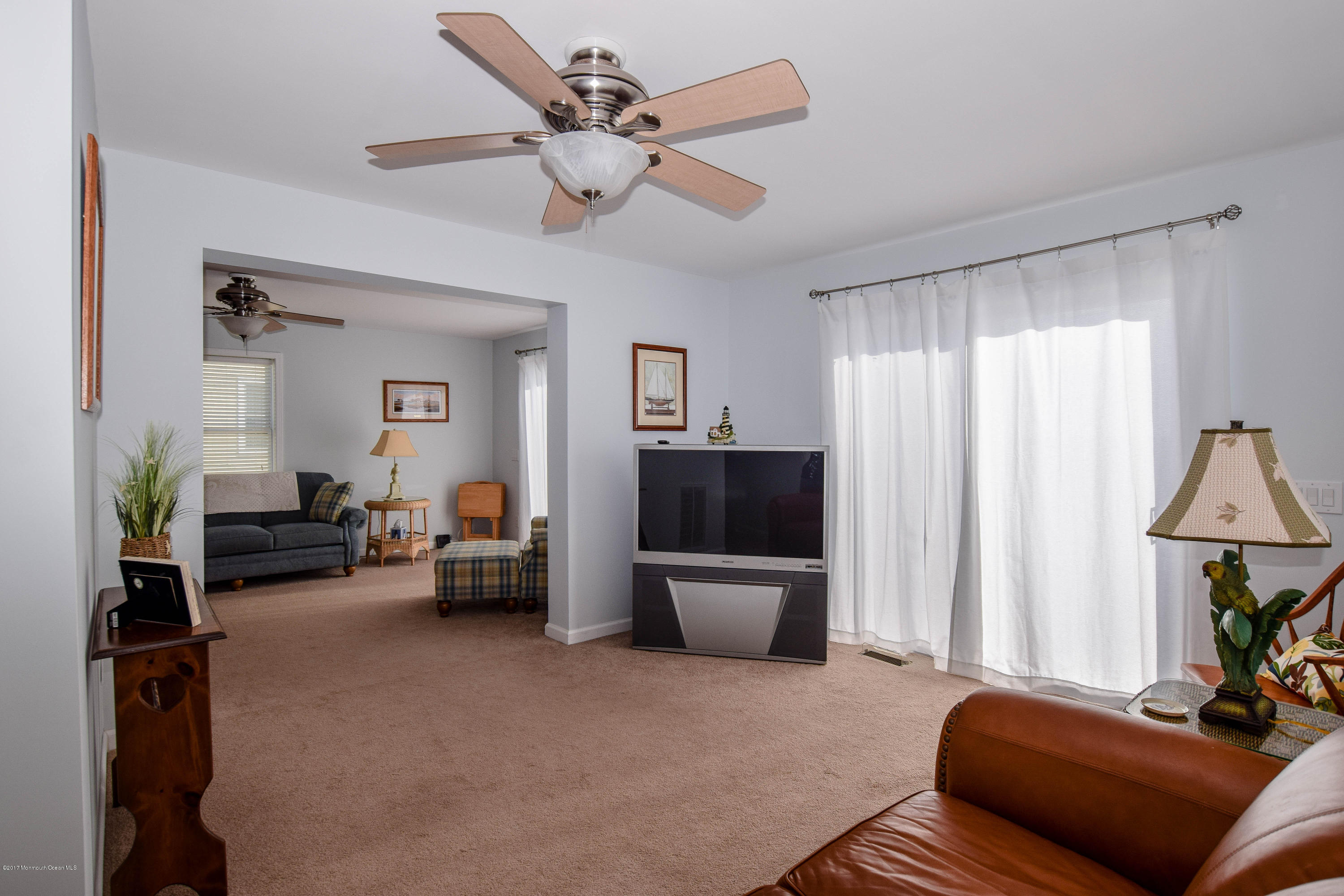 238 Heron Road Tuckerton, NJ 08087 - Photo 8 of 51 a living room with furniture and a flat screen tv