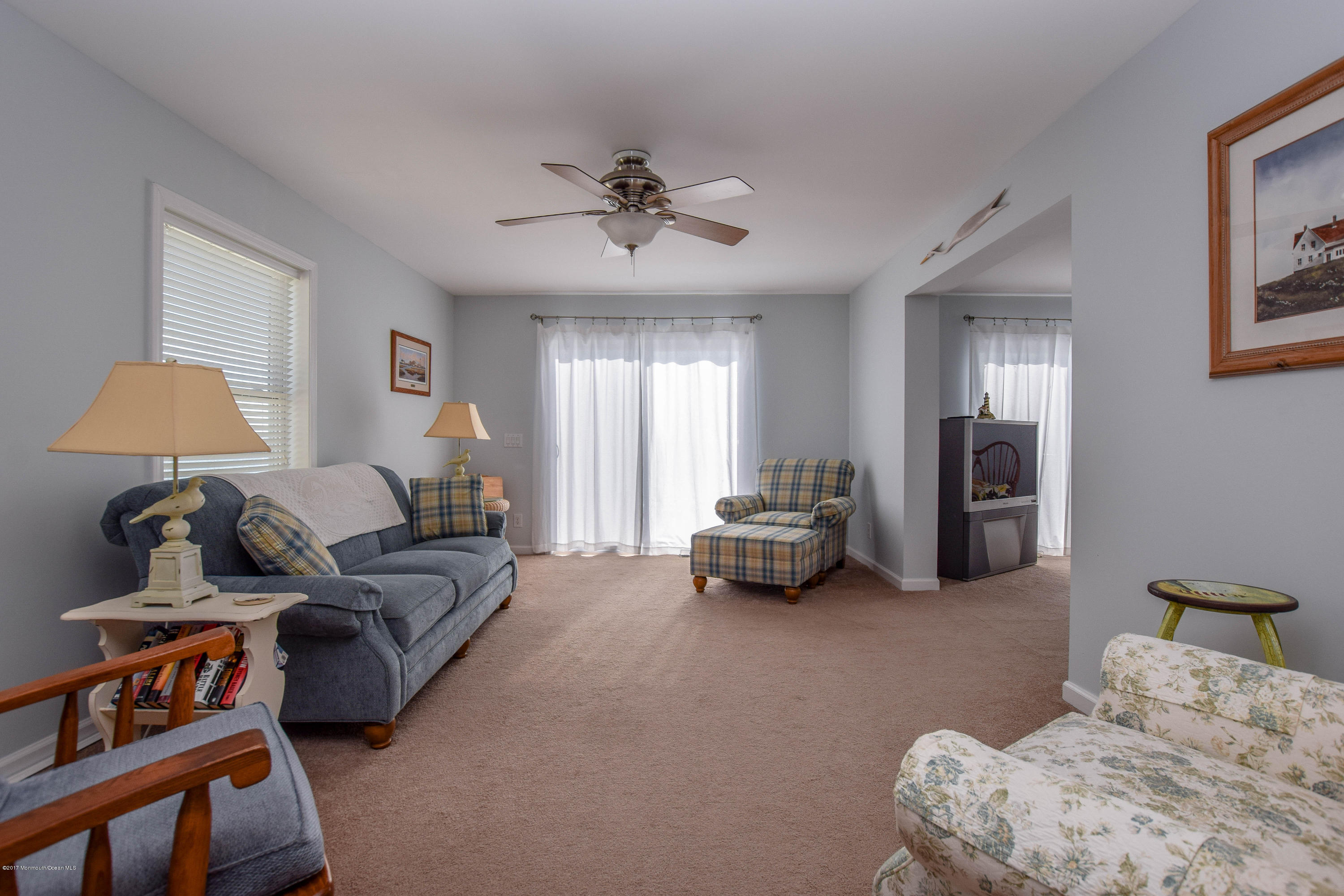 238 Heron Road Tuckerton, NJ 08087 - Photo 10 of 51 a living room with furniture and a chandelier