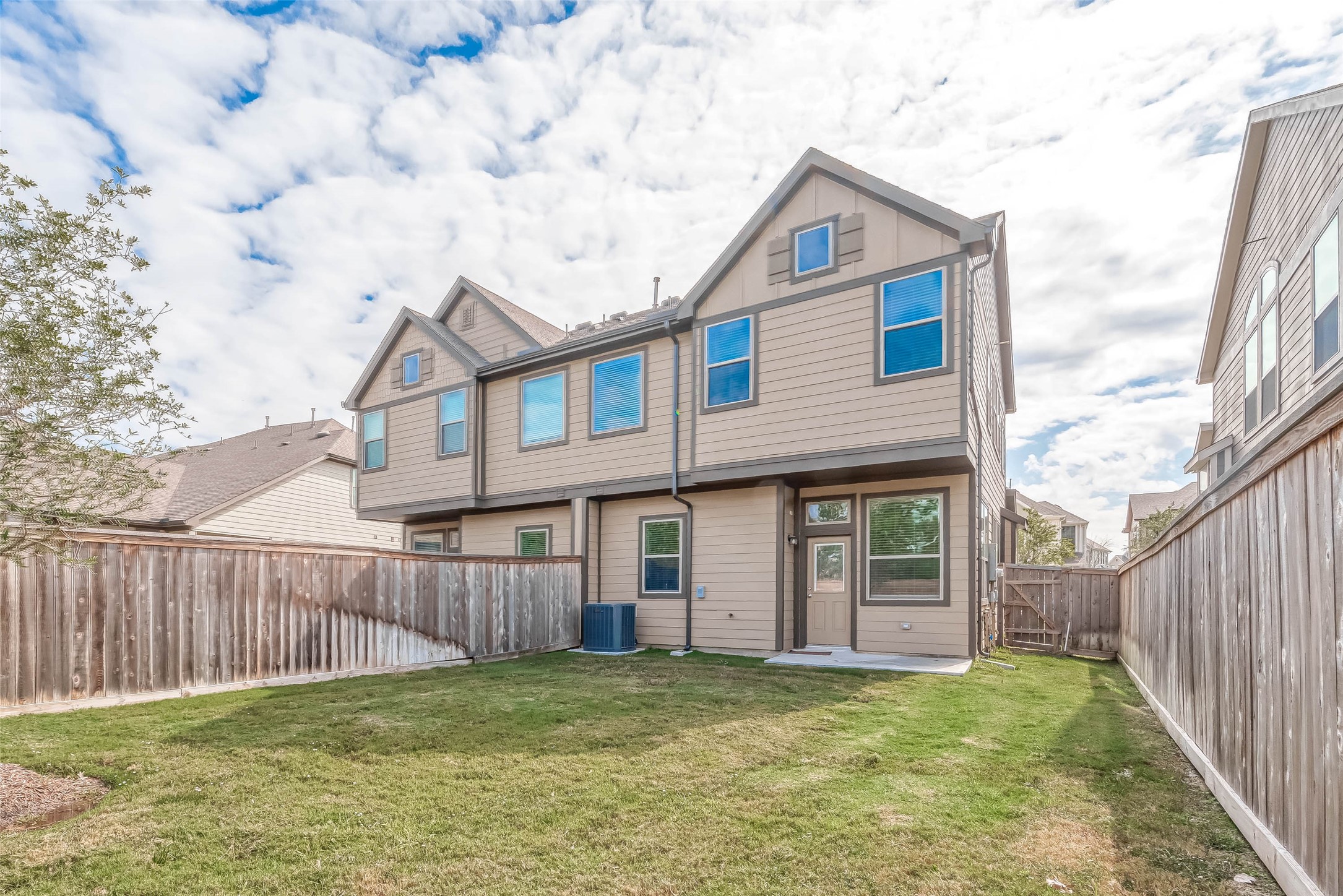 16111 Northern Cardinal Lane Cypress, TX 77433 - Photo 22 of 29 a front view of a house with a garden and deck
