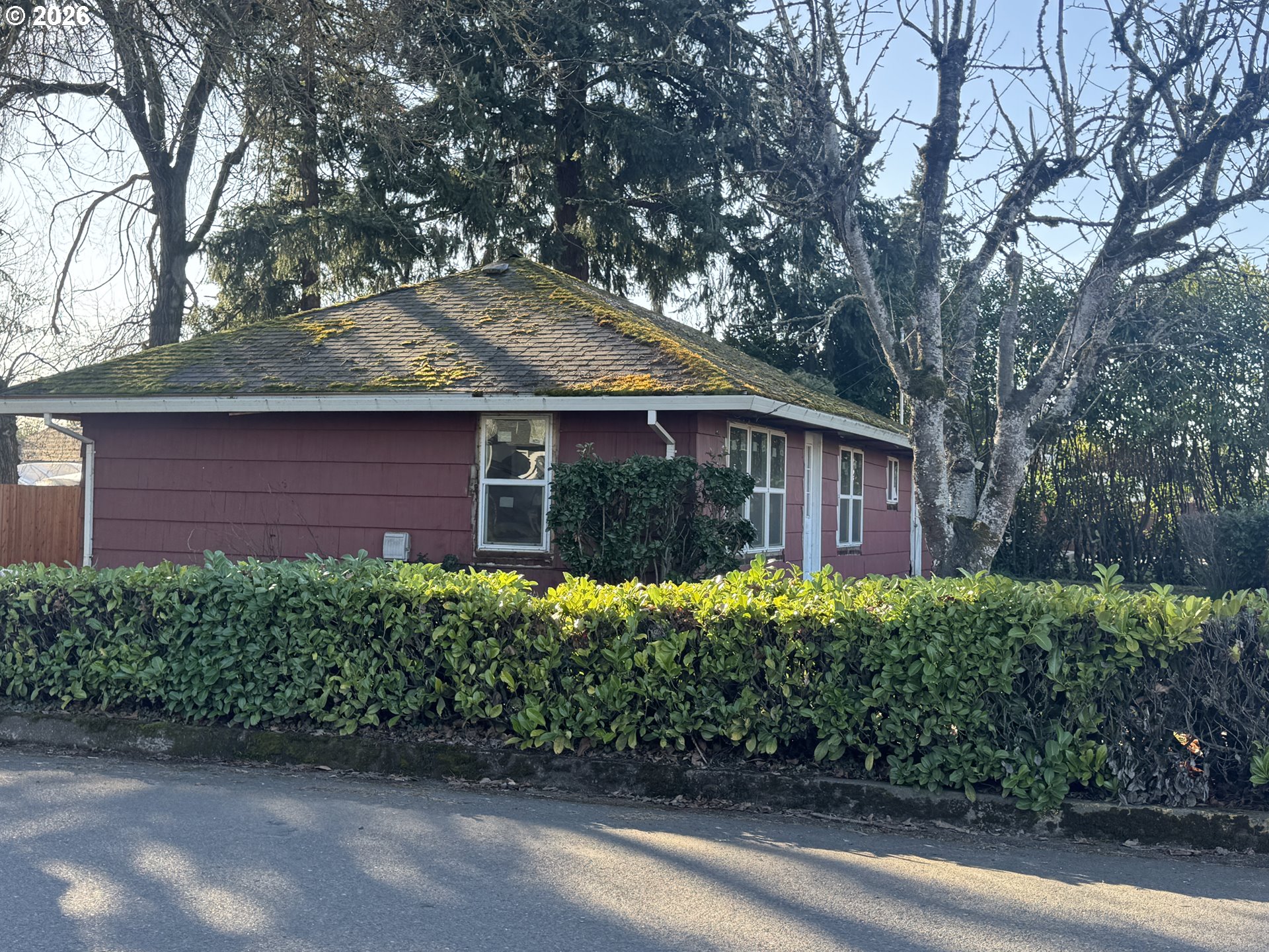 211 Sherman Street Amity, OR 97101 - Photo 2 of 5 a front view of a house with a garden