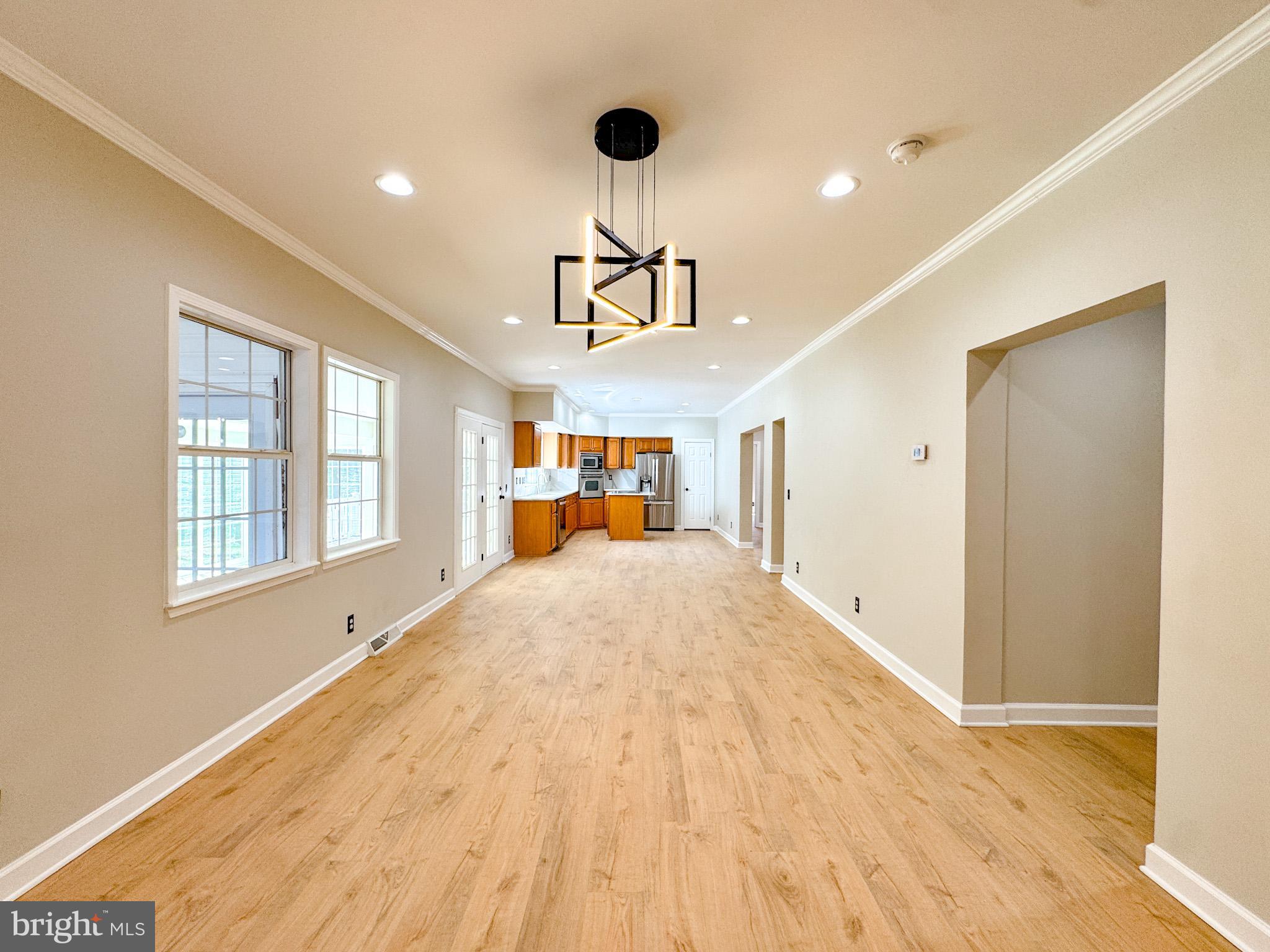 3631 Breaknock Road Bumpass, VA 23024 - Photo 16 of 47 Family Room to Kitchen