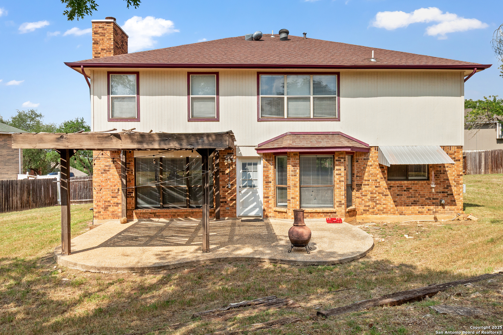 25002 Silverstone San Antonio, TX 78258 - Photo 23 of 26 a front view of a house with a porch