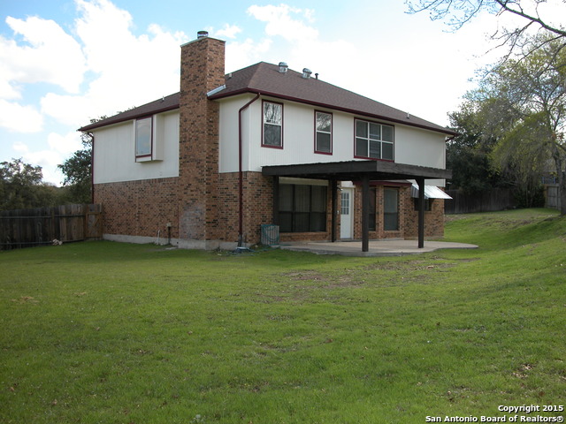 25002 Silverstone San Antonio, TX 78258 - Photo 26 of 26 a front view of a house with garden