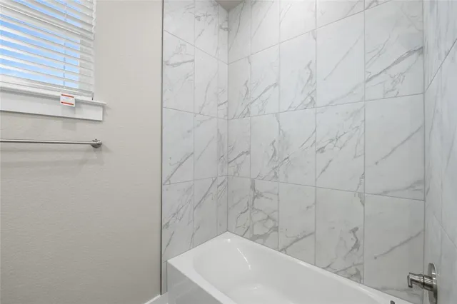 a bathroom with a bathtub