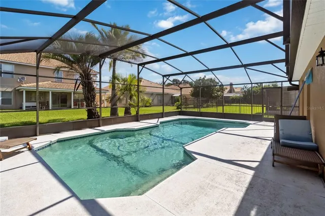 a view of yard with a patio