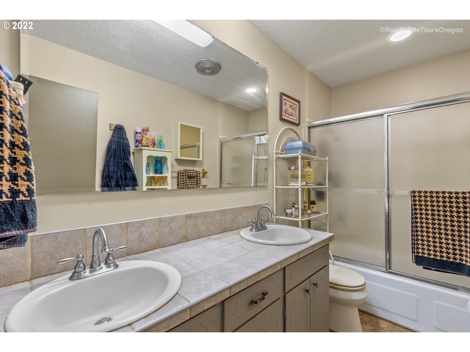 48780 Southeast Baty Road Sandy, OR 97055 - Photo 13 of 32 a bathroom with a double vanity sink toilet and shower