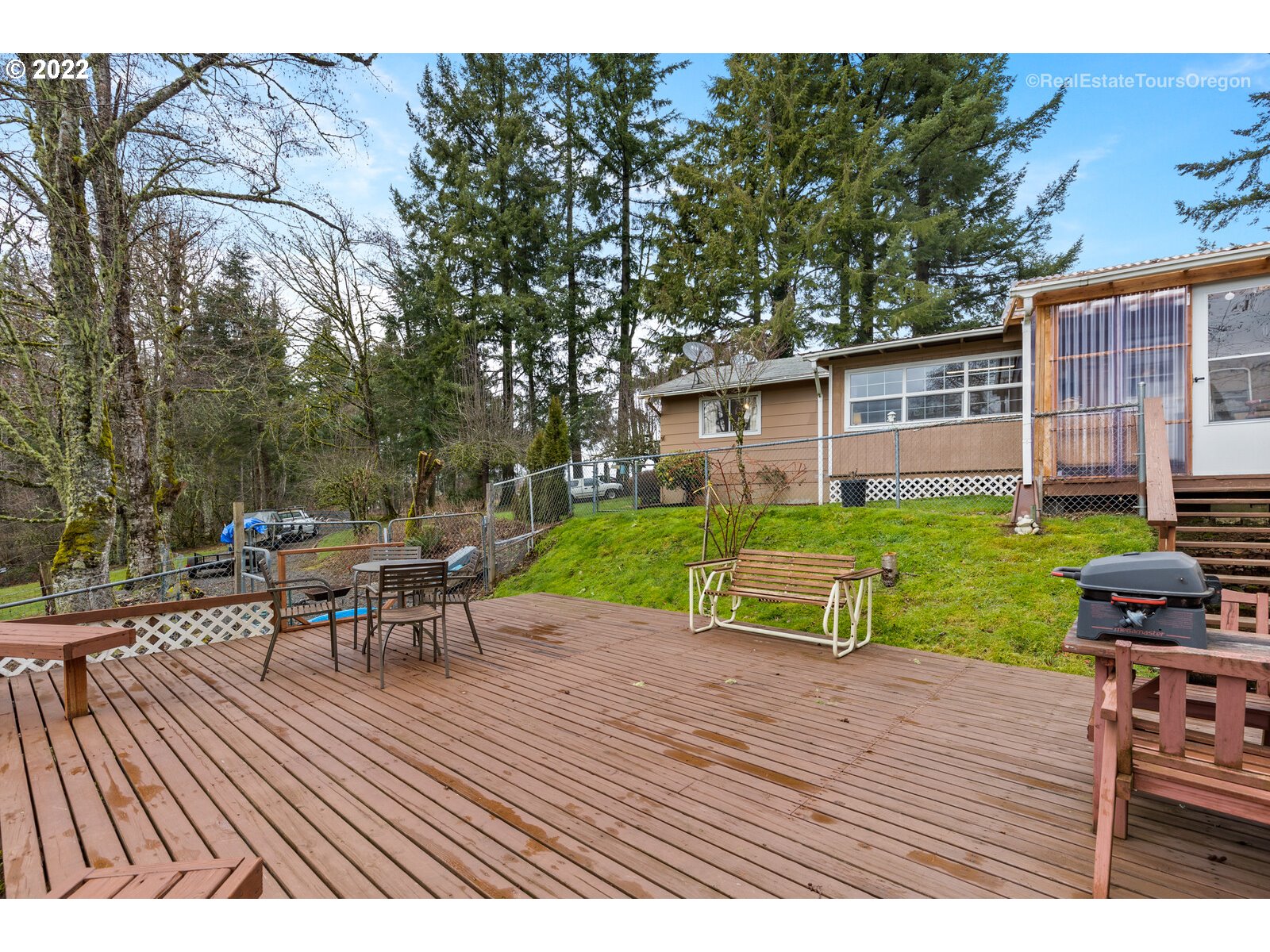 48780 Southeast Baty Road Sandy, OR 97055 - Photo 22 of 32 a view of a house with backyard sitting area and garden