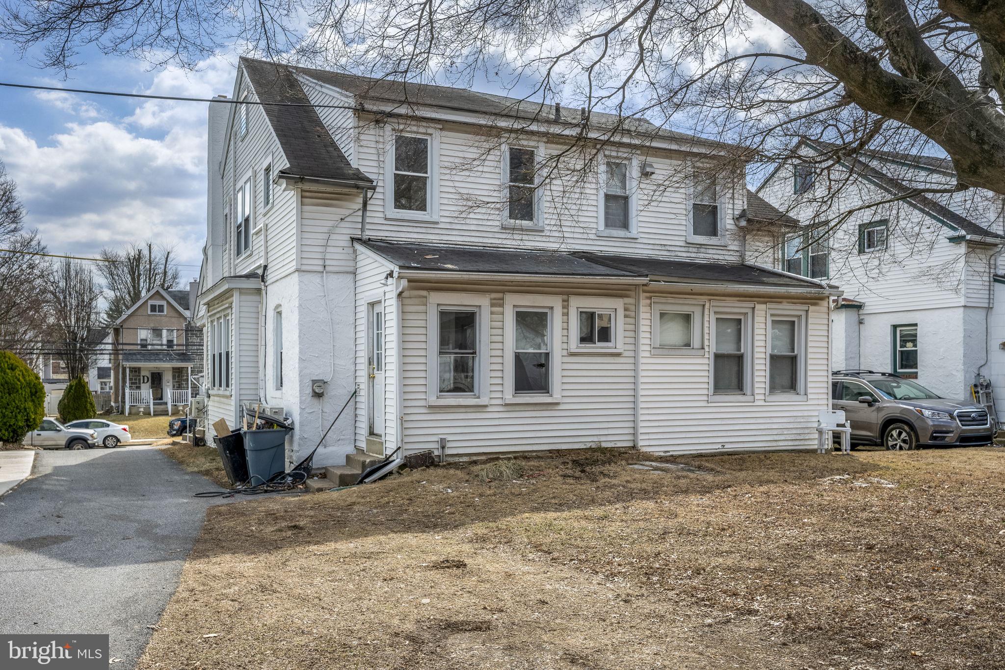 246 Powell Road Springfield, PA 19064 - Photo 20 of 29 a front view of a house with a yard