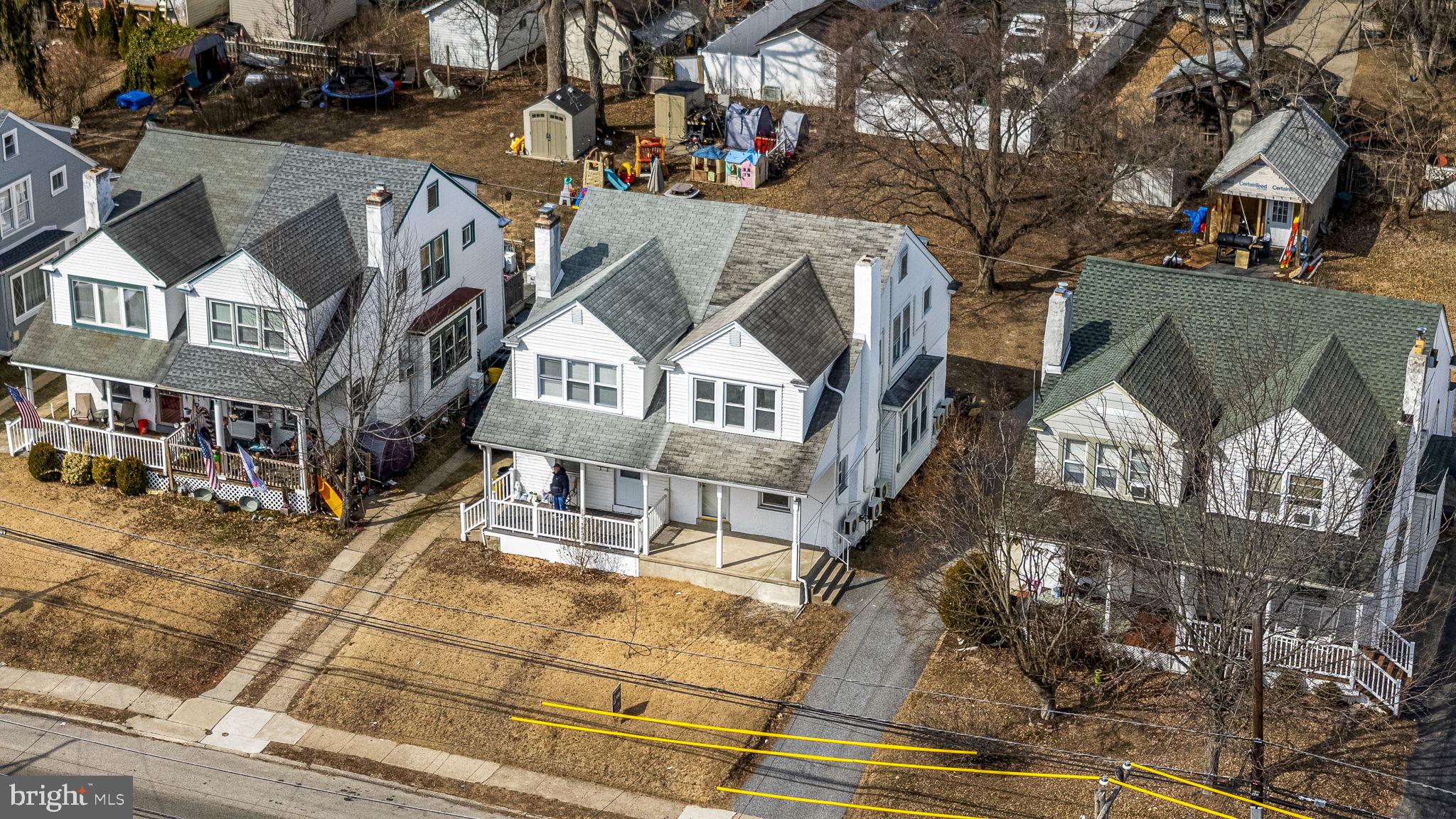 246 Powell Road Springfield, PA 19064 - Photo 22 of 29 a view of a white building among the street