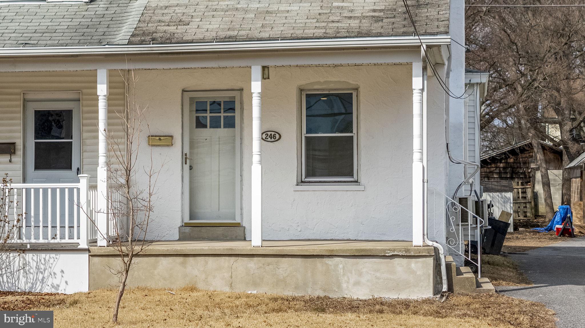 246 Powell Road Springfield, PA 19064 - Photo 23 of 29 a view of a house with a door and a window
