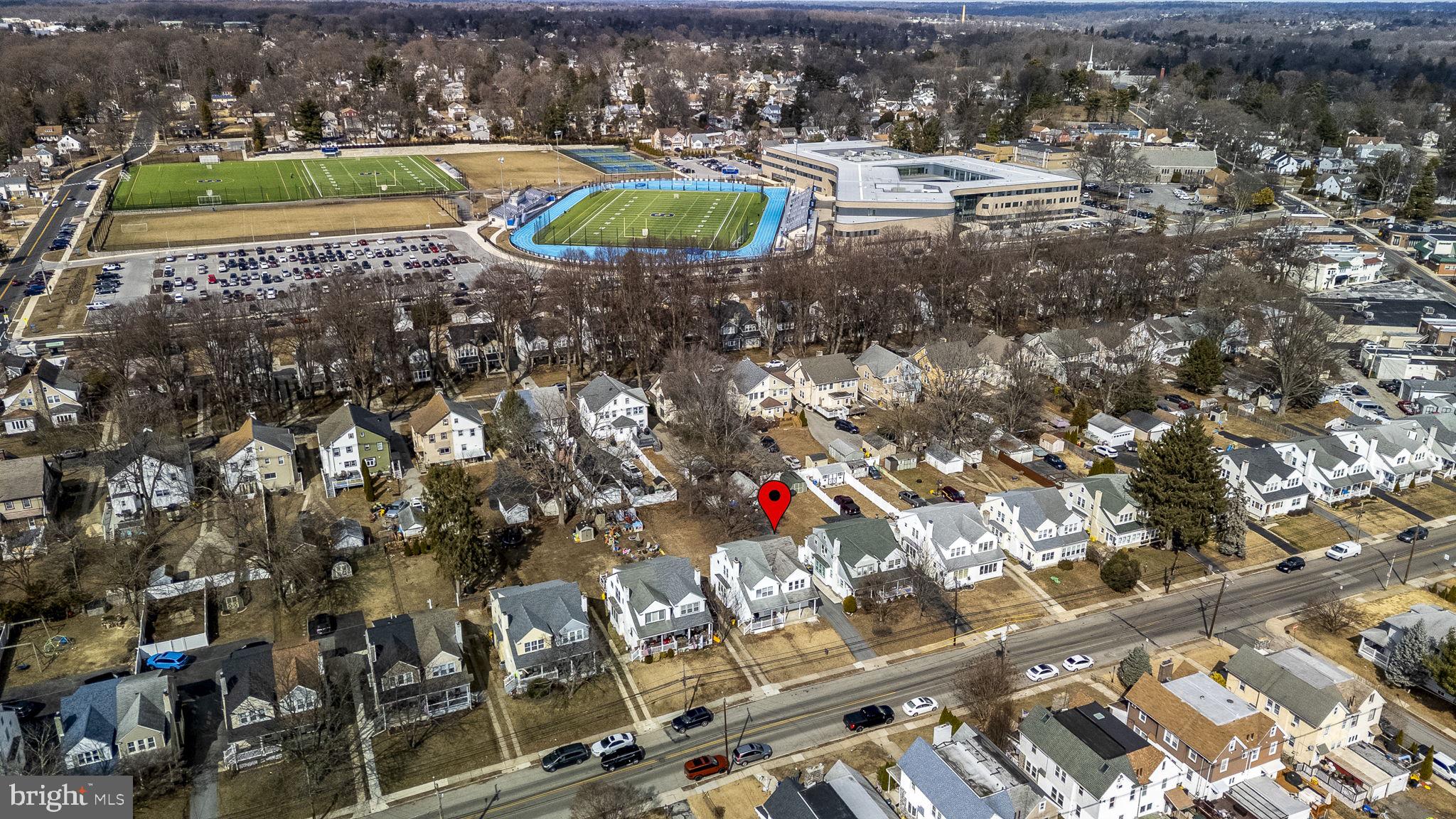 246 Powell Road Springfield, PA 19064 - Photo 24 of 29 an aerial view of a house with a swimming pool yard and outdoor seating