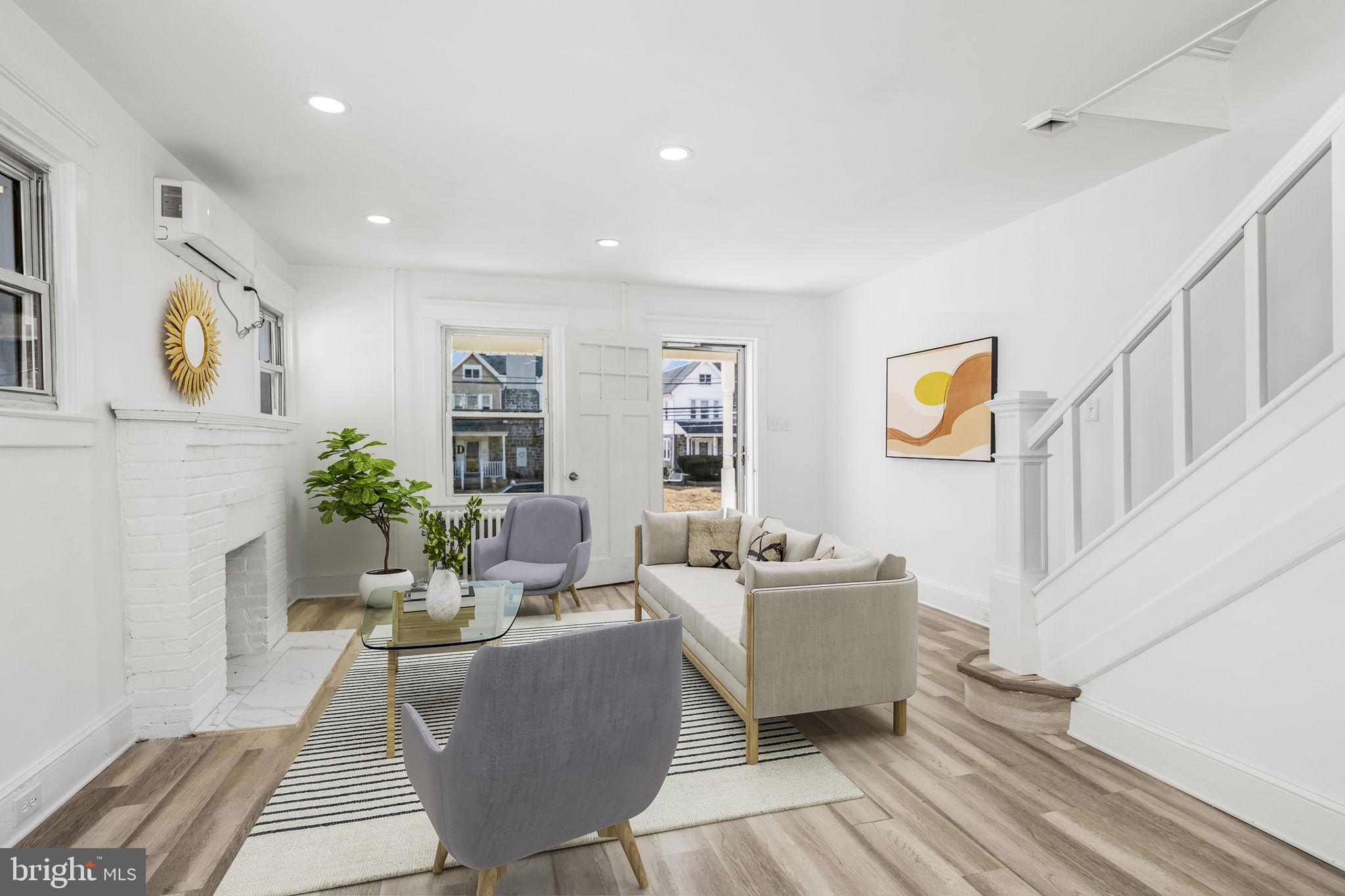 246 Powell Road Springfield, PA 19064 - Photo 3 of 29 a living room with furniture and a wooden floor