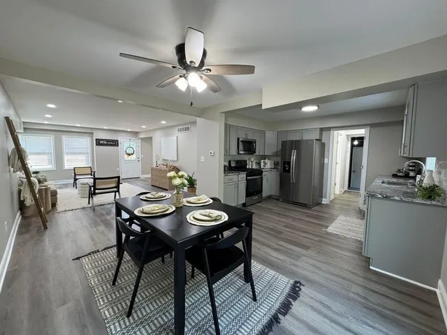 a view of a dining room with furniture