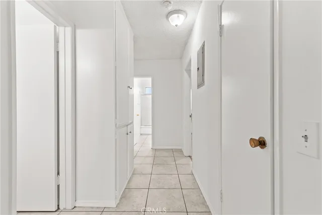 a bathroom with a glass door shower