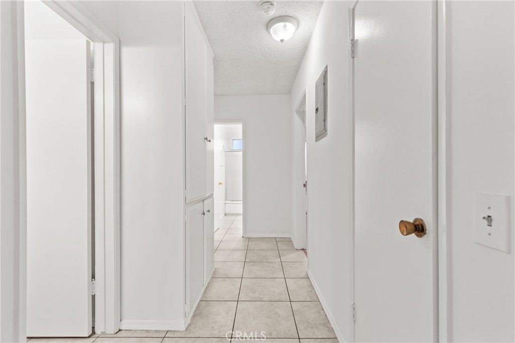 4924 Kester Avenue, Unit 10 Sherman Oaks, CA 91403 - Photo 12 of 17 a bathroom with a glass door shower