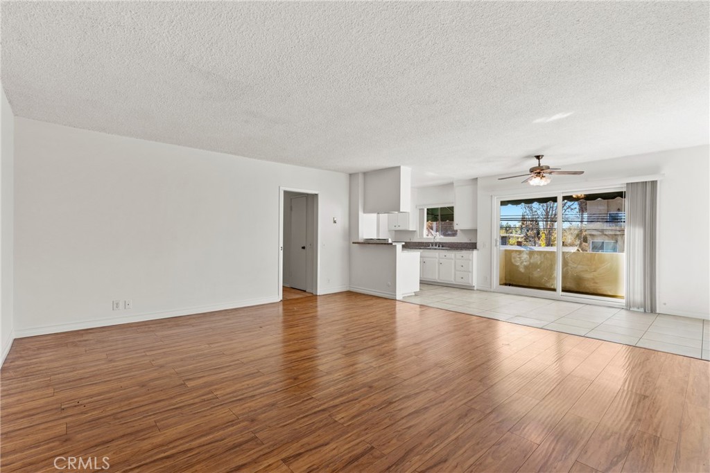 4924 Kester Avenue, Unit 10 Sherman Oaks, CA 91403 - Photo 2 of 17 a view of a kitchen with wooden floor