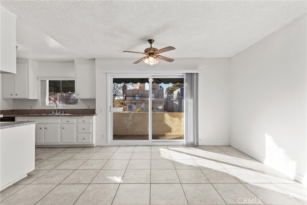 4924 Kester Avenue, Unit 10 Sherman Oaks, CA 91403 - Photo 8 of 17 a view of a kitchen with a sink and a window