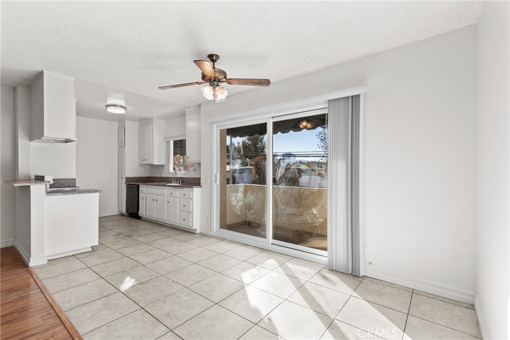 4924 Kester Avenue, Unit 10 Sherman Oaks, CA 91403 - Photo 9 of 17 a view of a kitchen with microwave and refrigerator